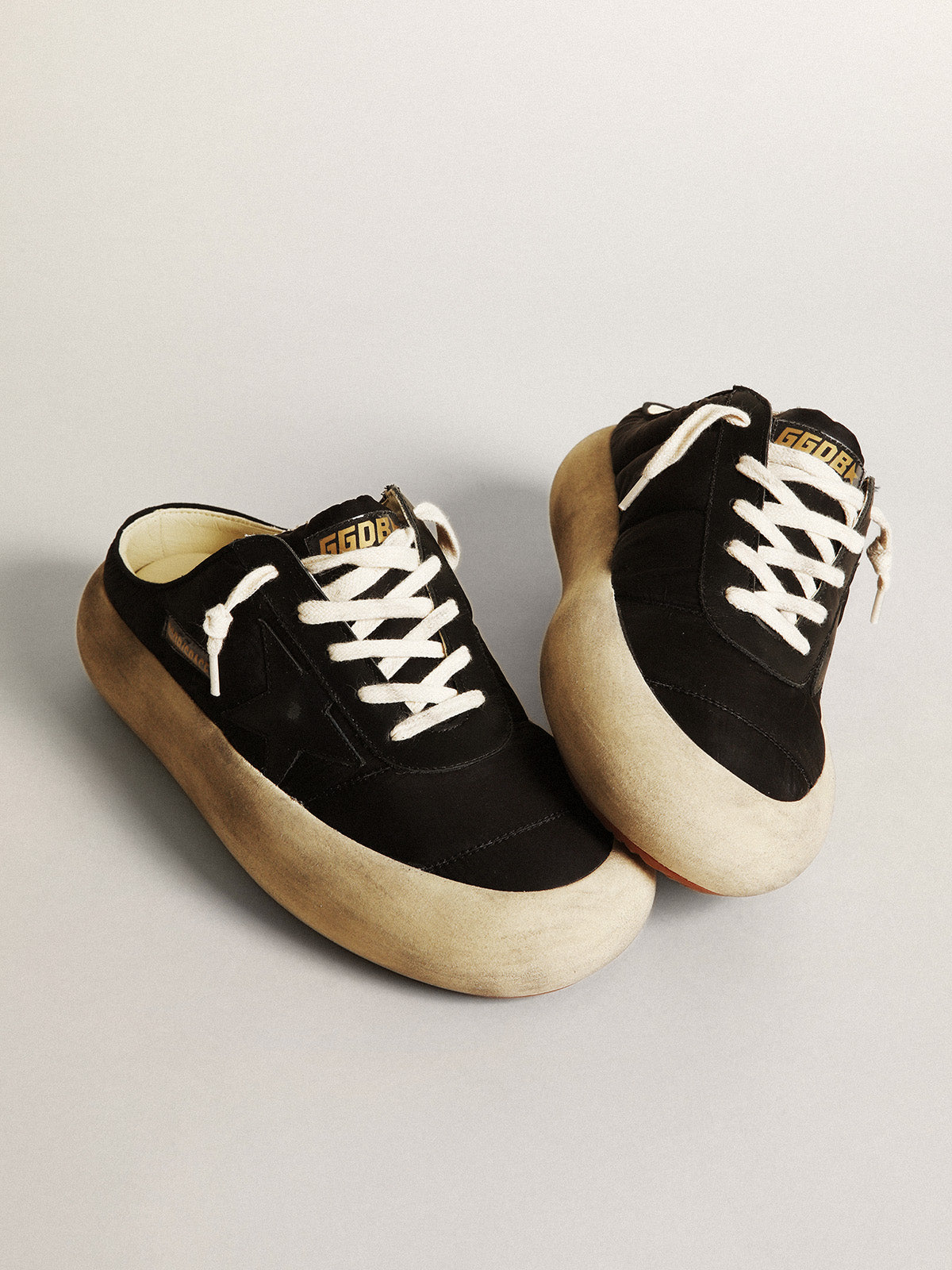 Women's Space-Star Sabots in black nylon with black leather star| Golden Goose