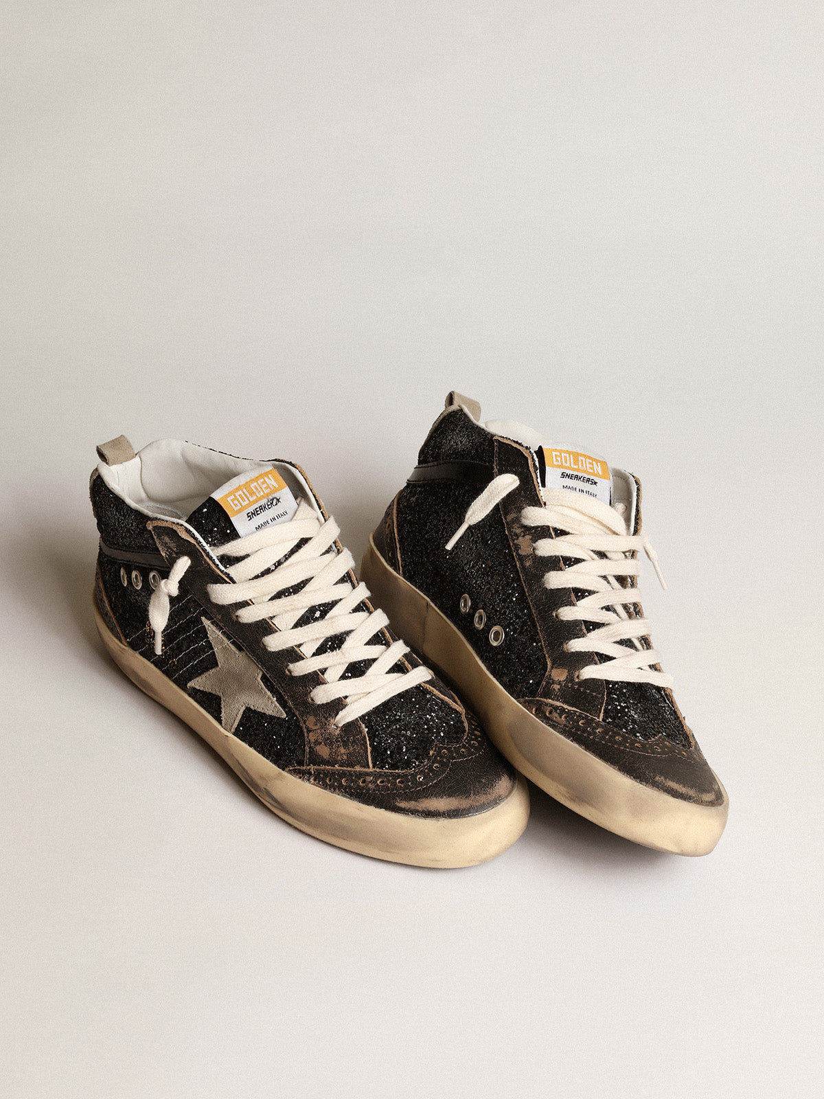 Mid Star in black glitter with dove-gray suede star and heel tab| Golden Goose