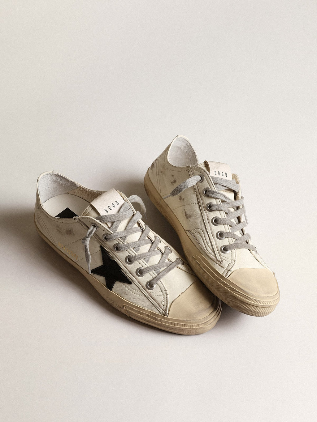 V-Star sneakers in off-white nappa leather with black nubuck star| Golden Goose