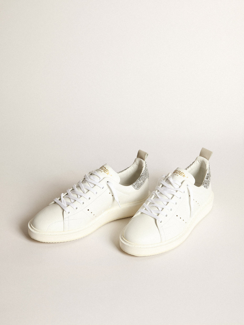 Starter sneakers in white leather with silver glitter heel tab| Golden Goose