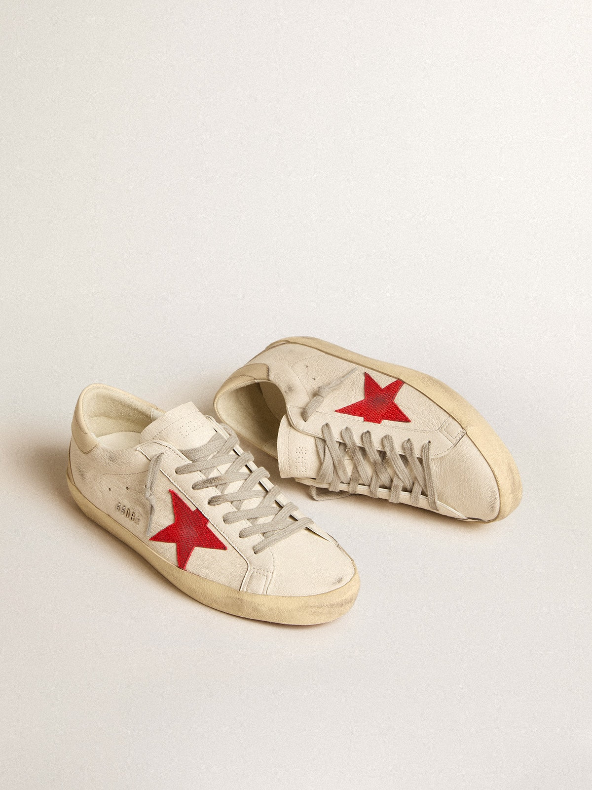 Super-Star in nappa with red star and cream leather heel tab| Golden Goose