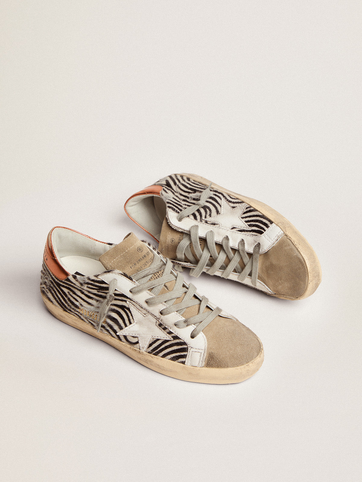 Women's Super-Star LTD in zebra print pony skin with white star| Golden Goose