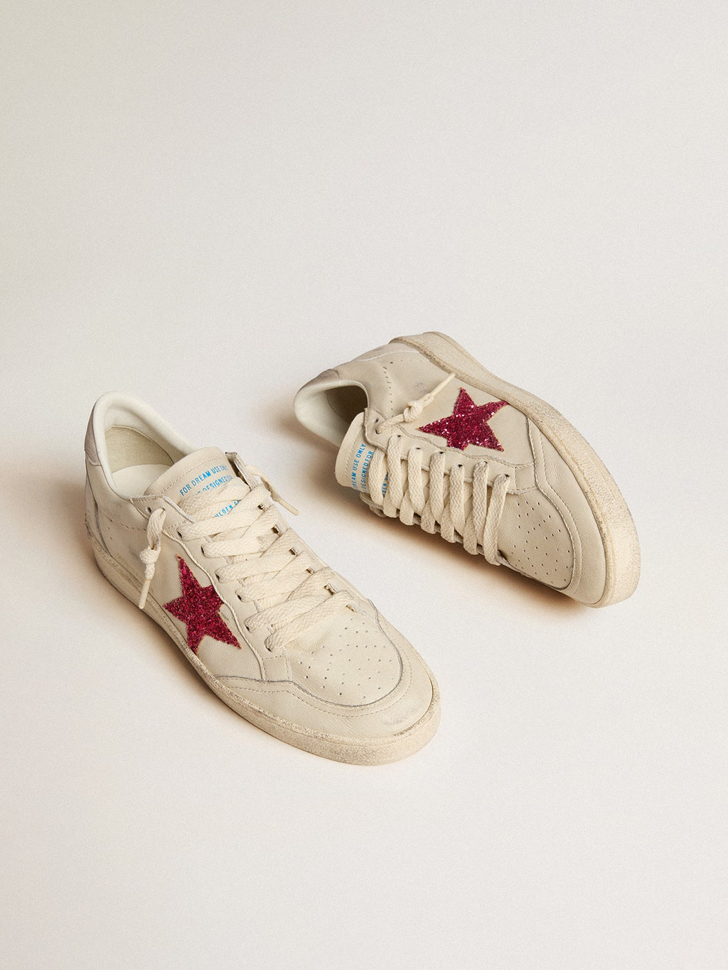 Ball Star LTD with fuchsia glitter star and light gray suede heel tab| Golden Goose