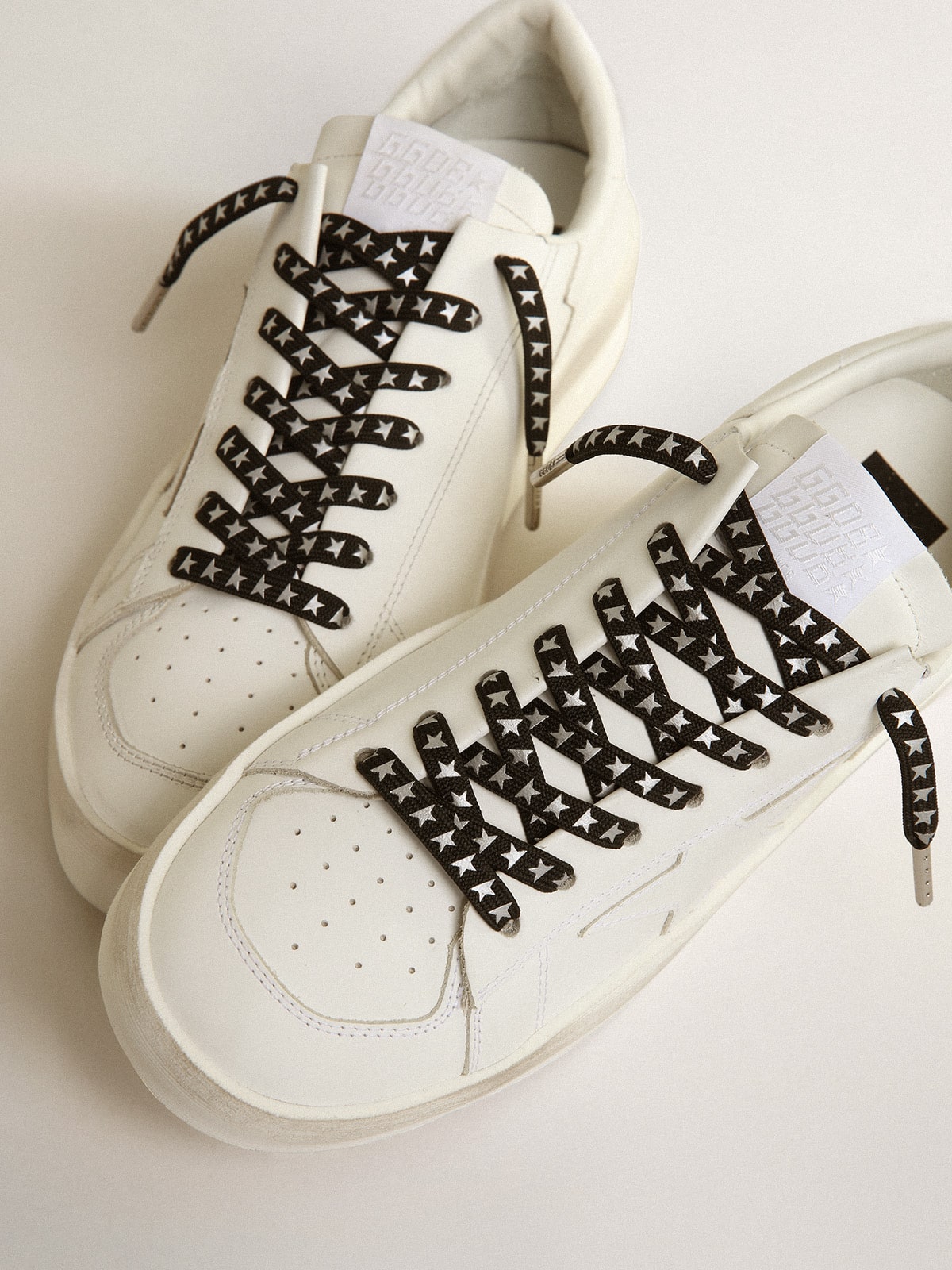 Black cotton laces with contrasting silver stars| Golden Goose
