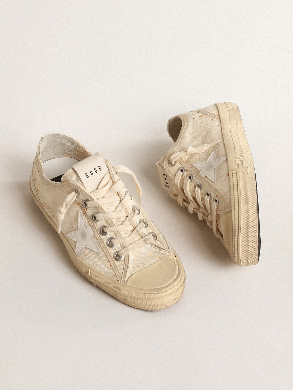 Women's V-Star LAB in canvas with leather star and rust-colored speckles| Golden Goose