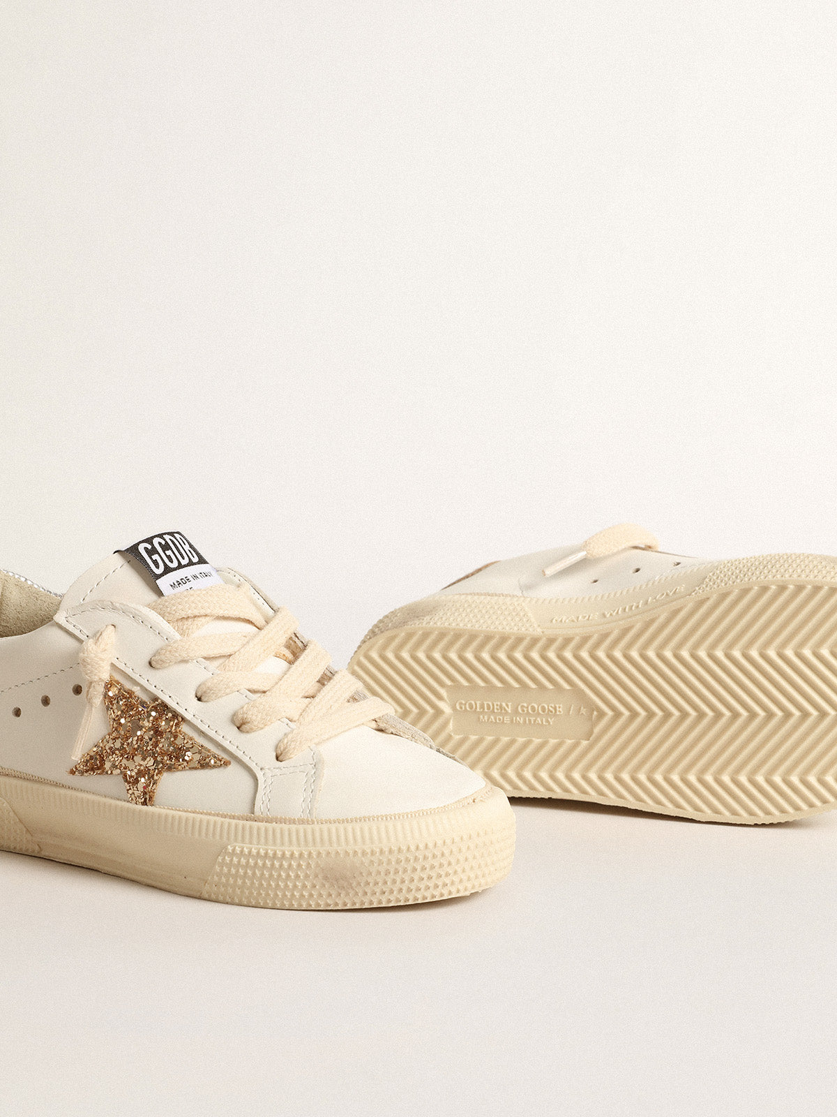 May Young with gold glitter star and metallic leather heel tab| Golden Goose
