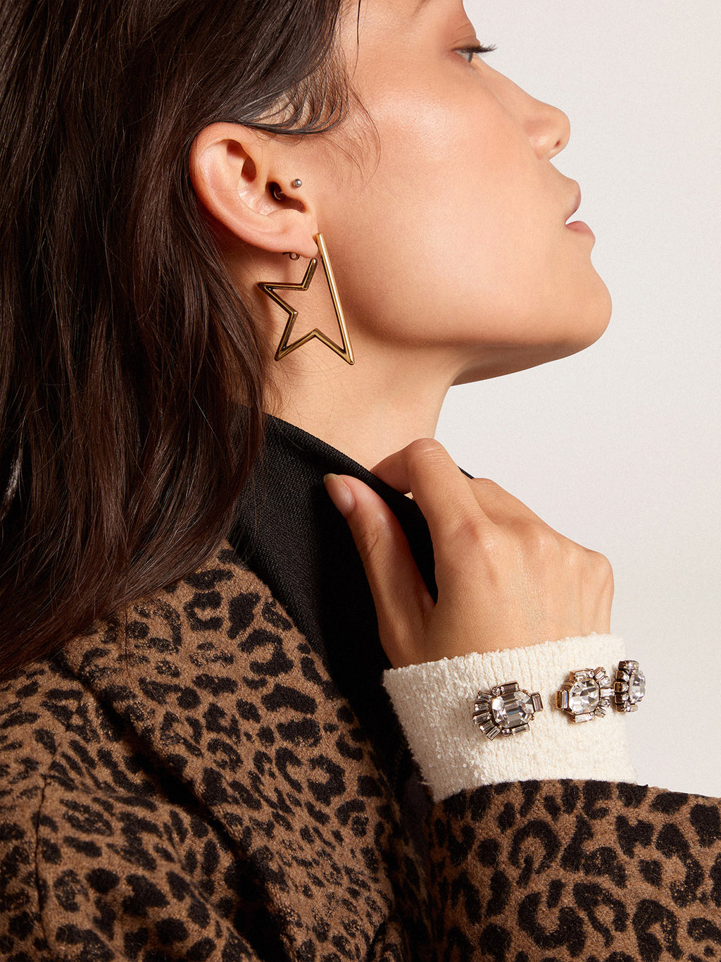White cuff with baguette-shaped crystals| Golden Goose