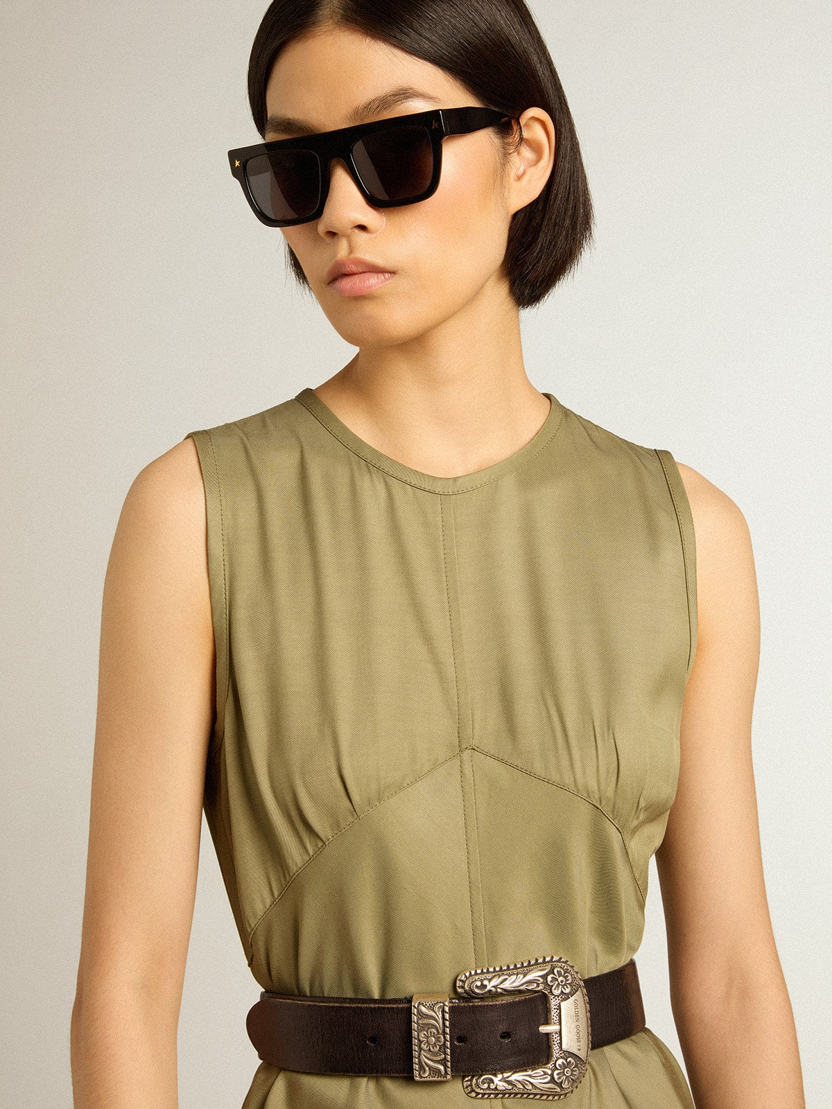 Olive-colored women's midi dress with zip fastening on the back