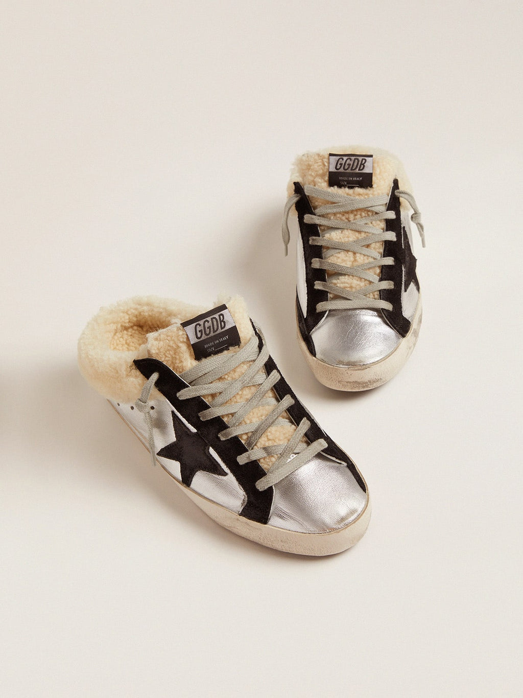 Women's Super-Star Sabot in silver laminated leather with black star| Golden Goose