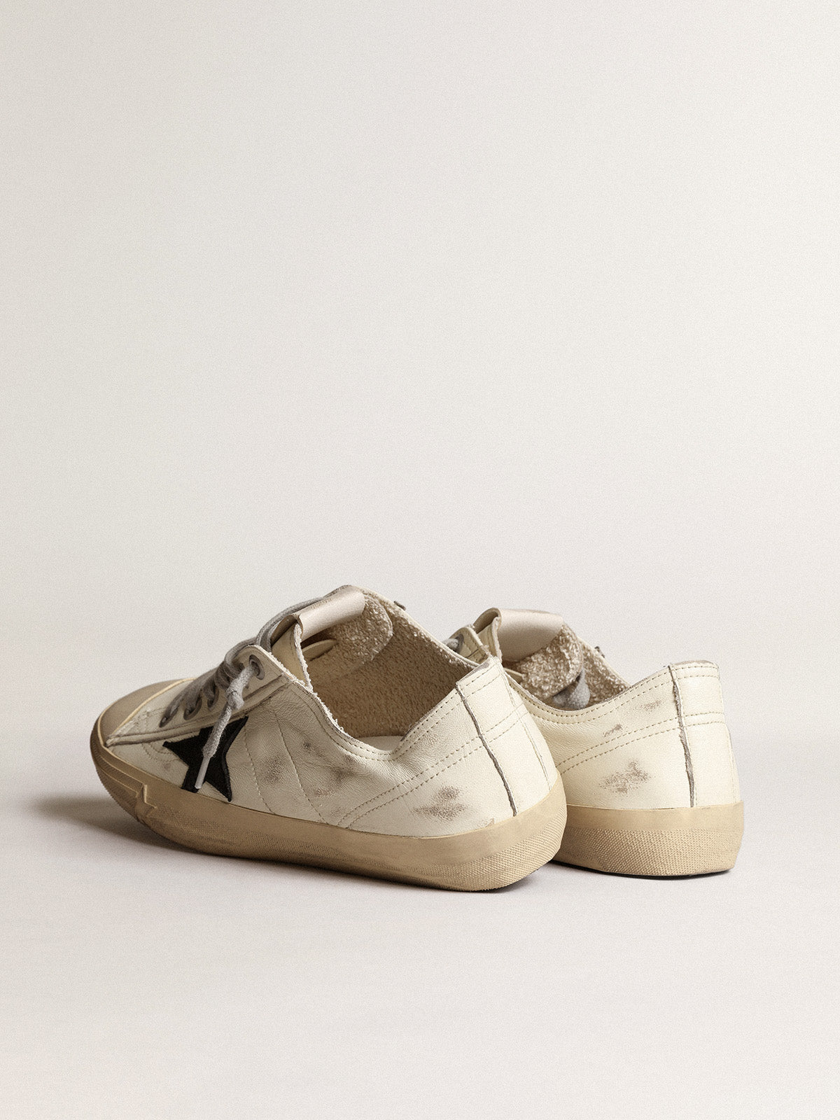 V-Star sneakers in off-white nappa leather with black nubuck star| Golden Goose
