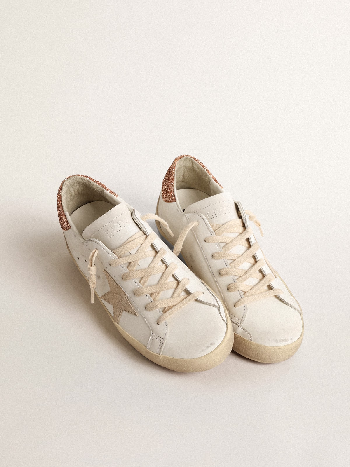 Women's Super-Star with a suede star and peach-pink glitter heel tab| Golden Goose