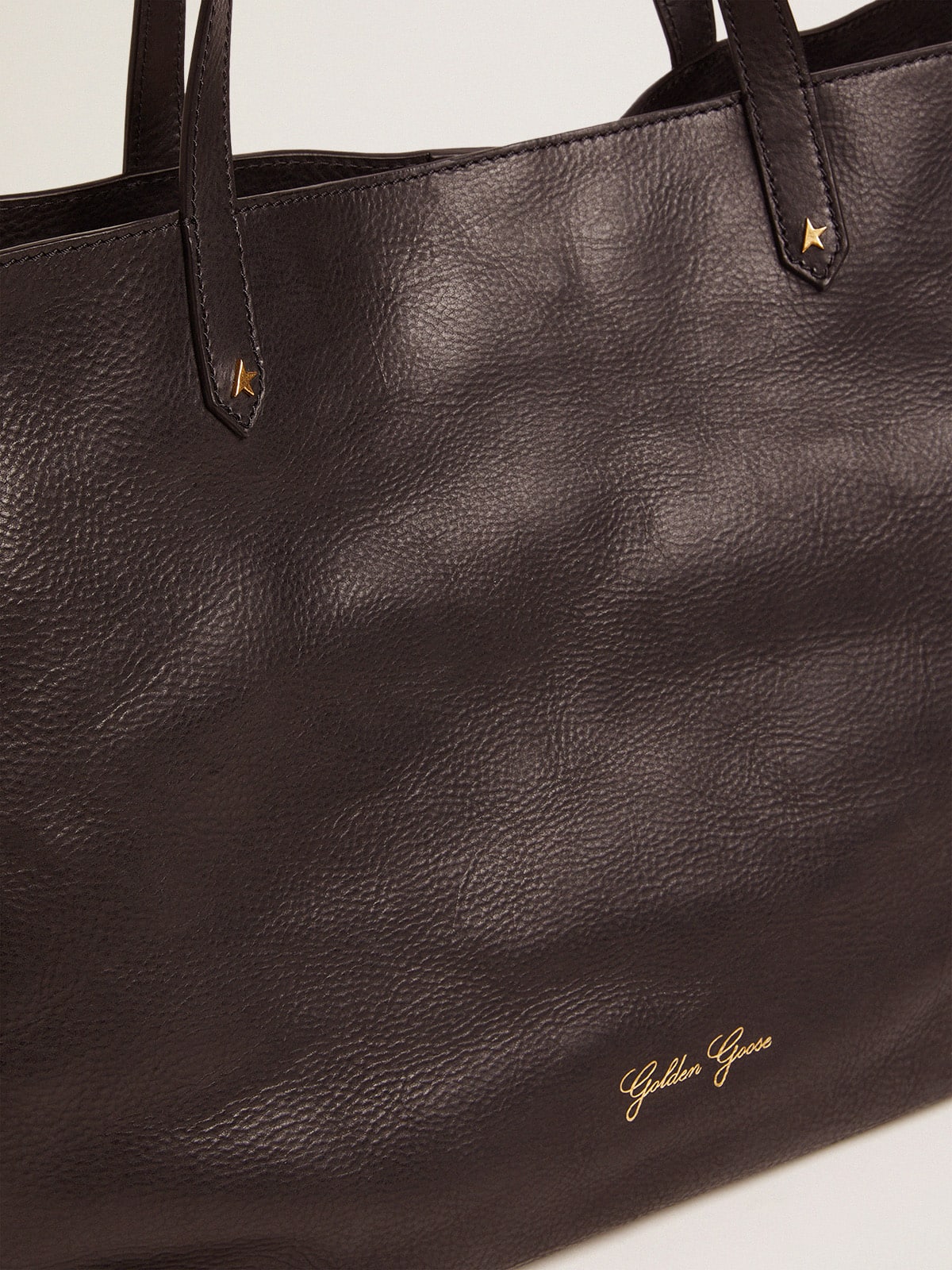Pasadena Bag in black hammered leather with gold logo on the front| Golden Goose
