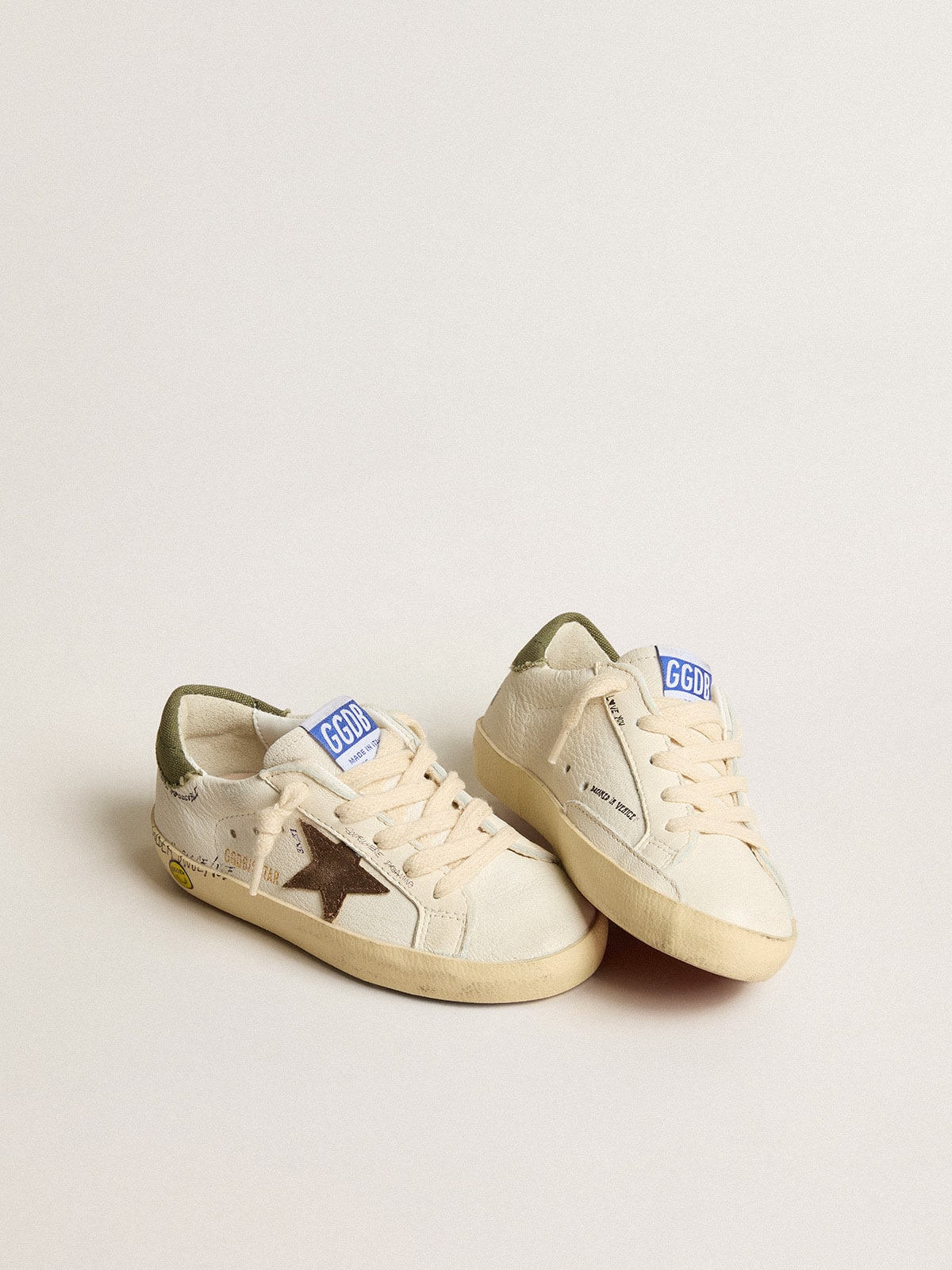 Super-Star Junior in nappa with suede star and green heel tab| Golden Goose
