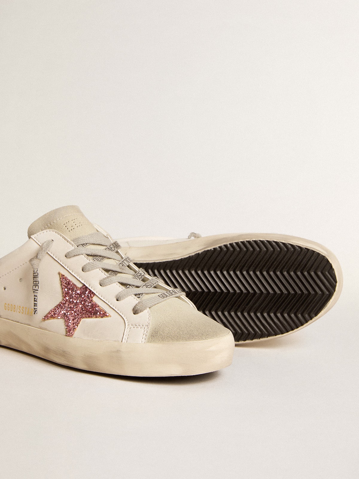 Bio-based Super-Star Sabot with pink glitter star and suede toe| Golden Goose