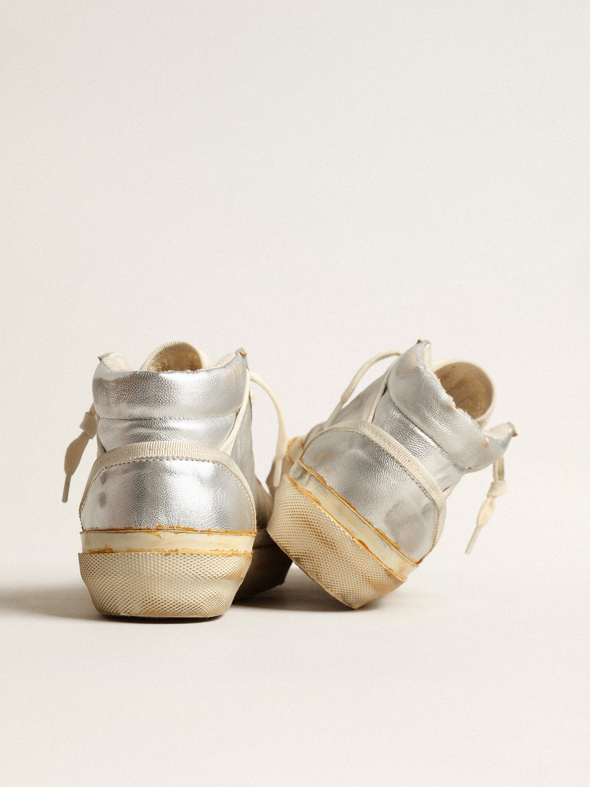 Women's Mid Star in silver metallic leather with ivory star| Golden Goose