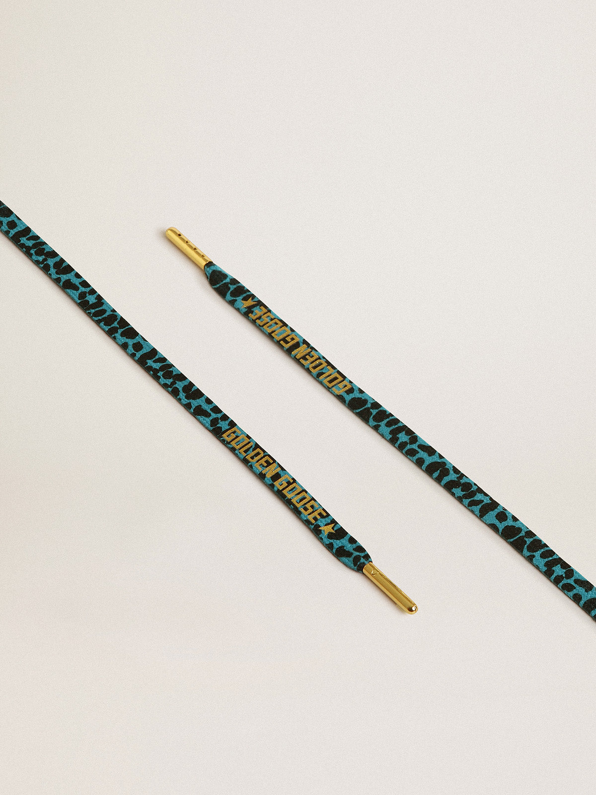 Light blue and black animal-print laces with contrasting gold-colored logo| Golden Goose