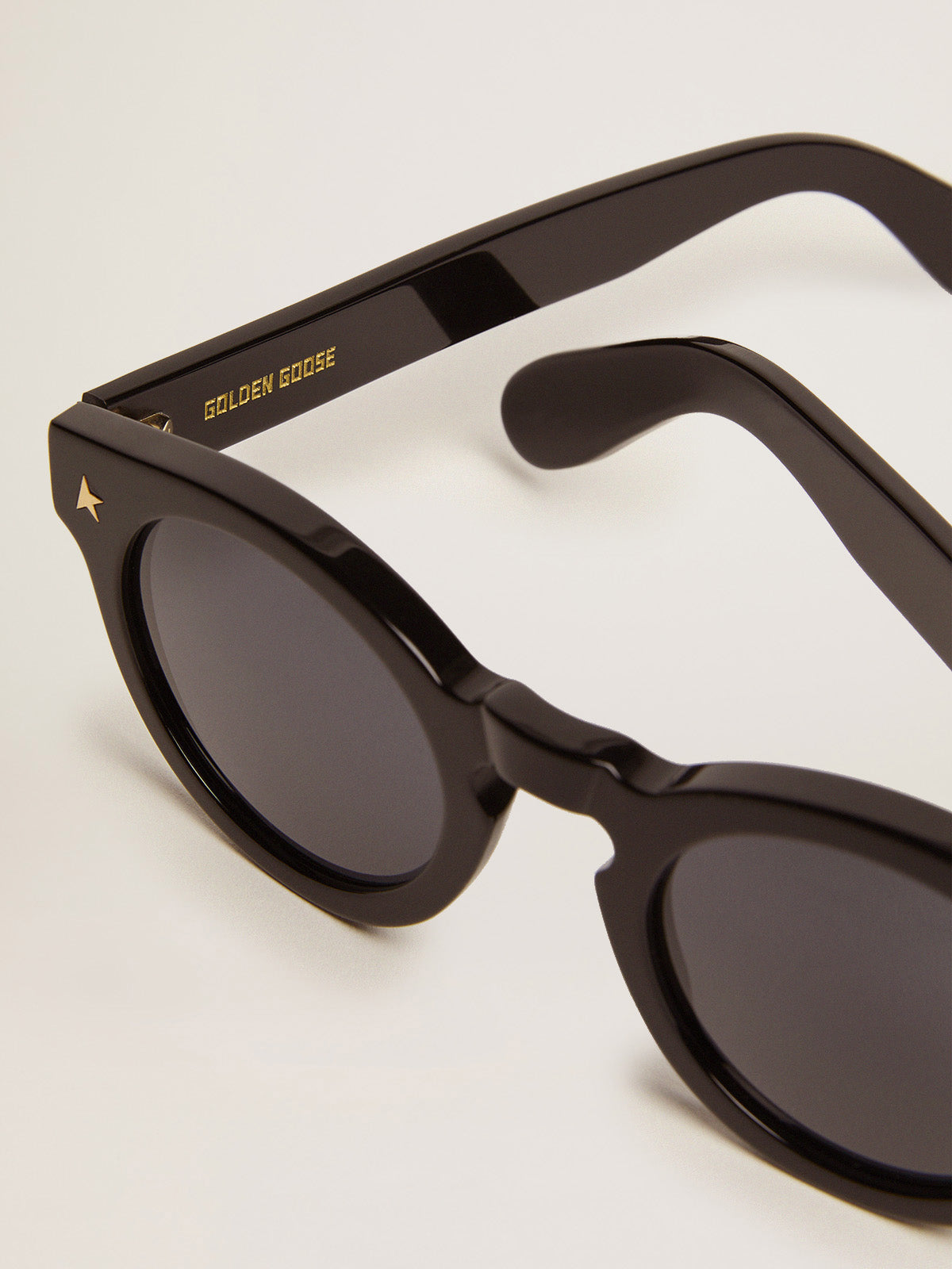 Sunframe Panthos model with black frame and gold details| Golden Goose