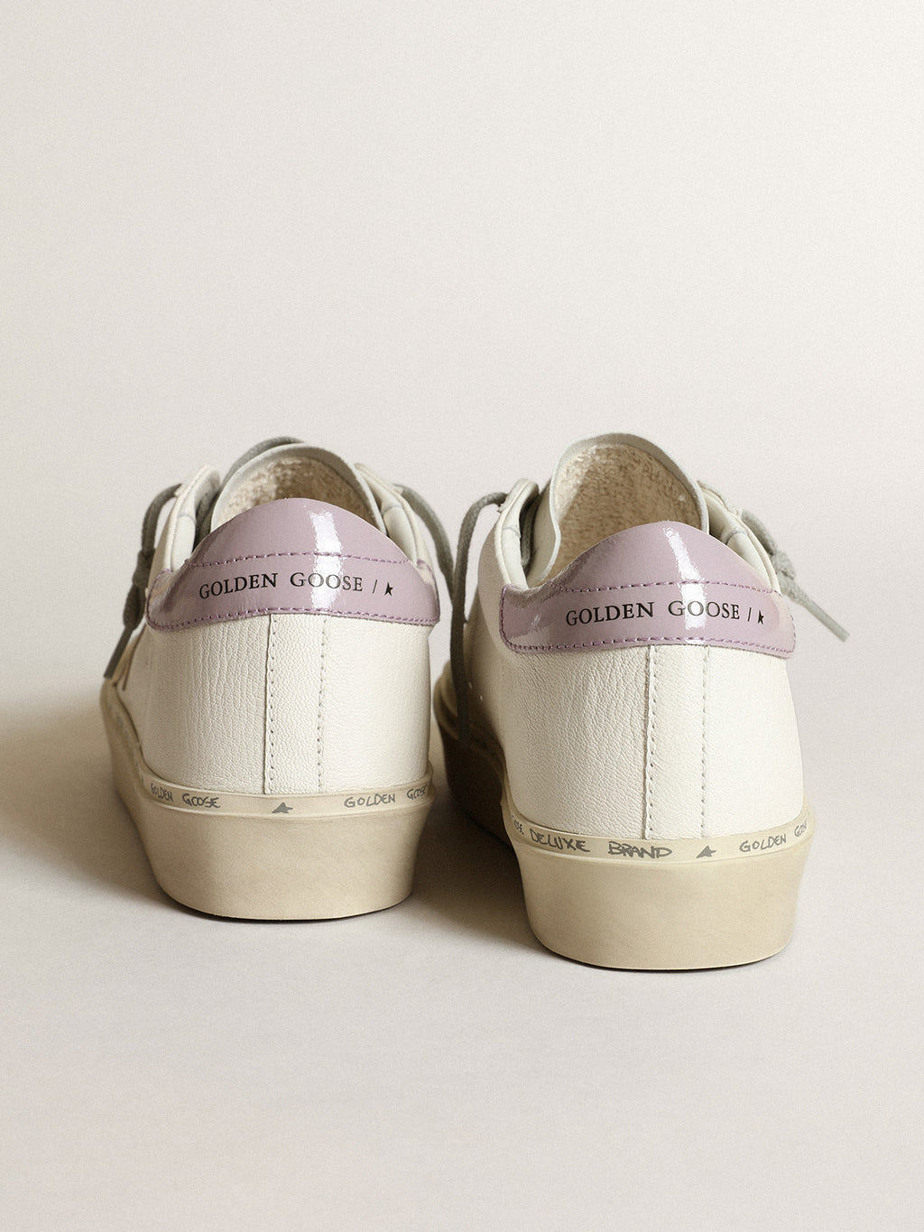 White Hi Star with a gold star and lilac naplak heel tab| Golden Goose