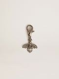 Bee-shaped charm in silver-colored brass with crystals| Golden Goose