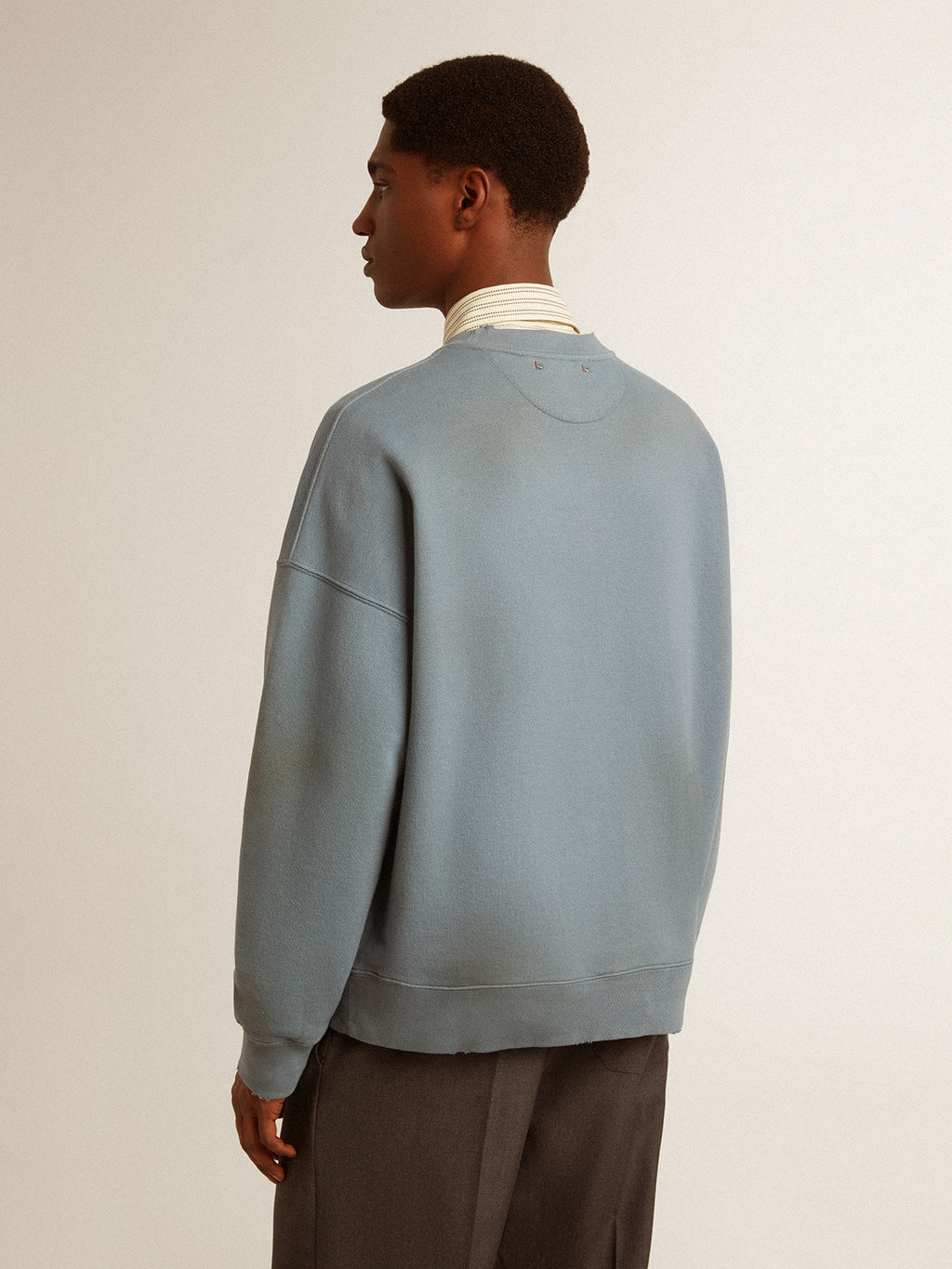 Oversized sweatshirt in baby blue with distressed finish| Golden Goose
