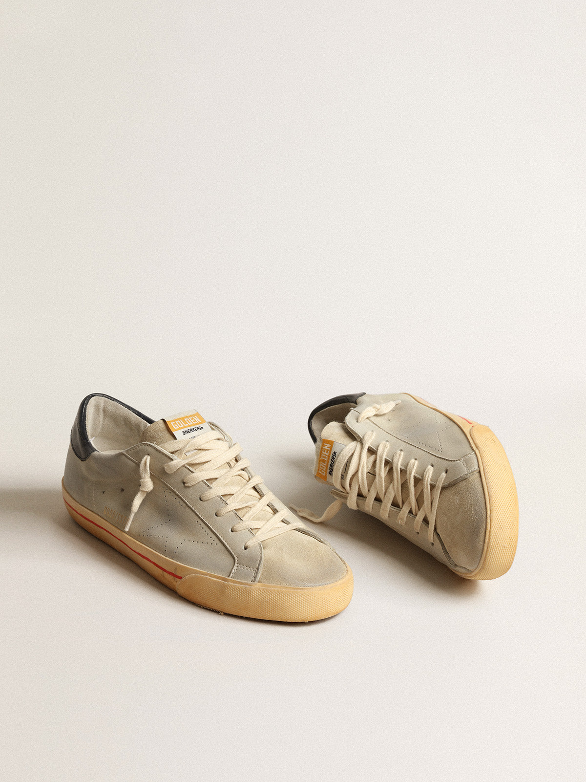 Super-Star in gray nubuck with perforated star and blue heel tab| Golden Goose