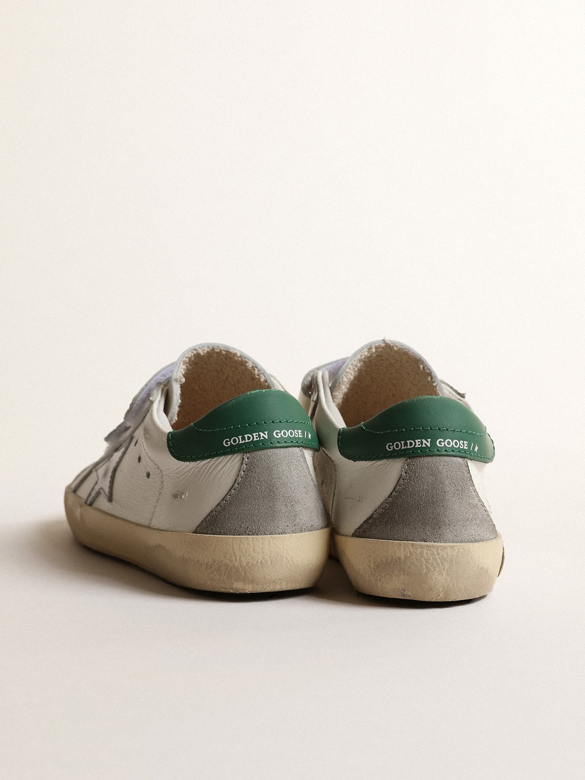 Old School Young with metallic leather star and green heel tab| Golden Goose