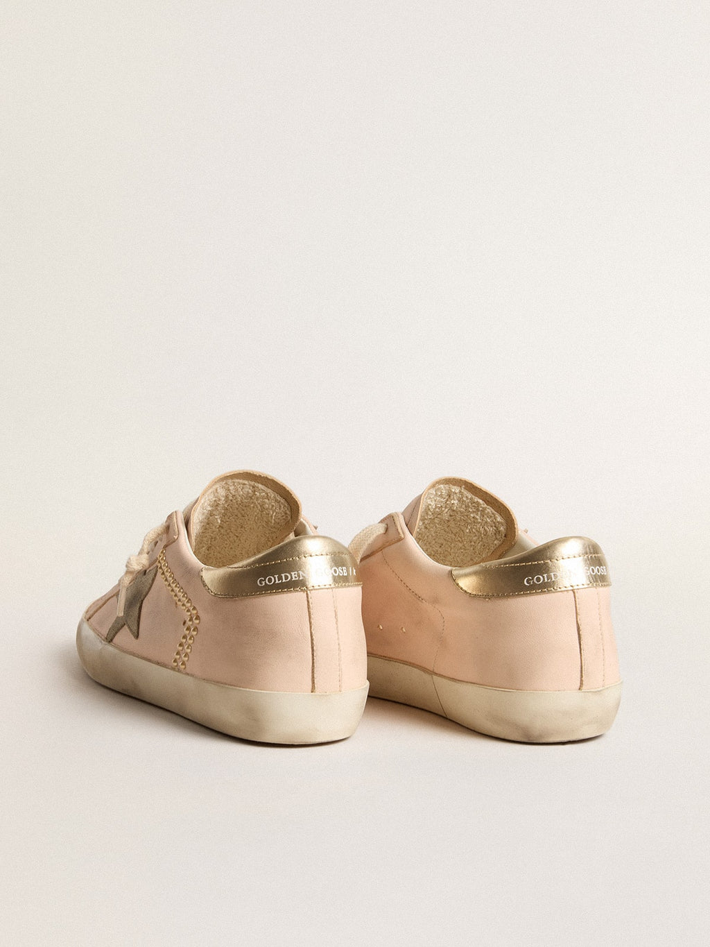 Women's Super-Star in pink nappa with ice-gray star and platinum heel tab| Golden Goose