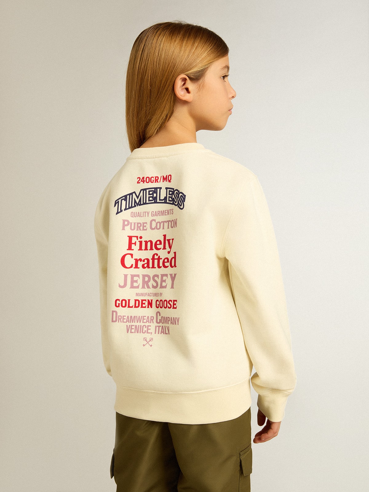 Girls' T-shirt in worn white with embroidery on the front and print on the back| Golden Goose