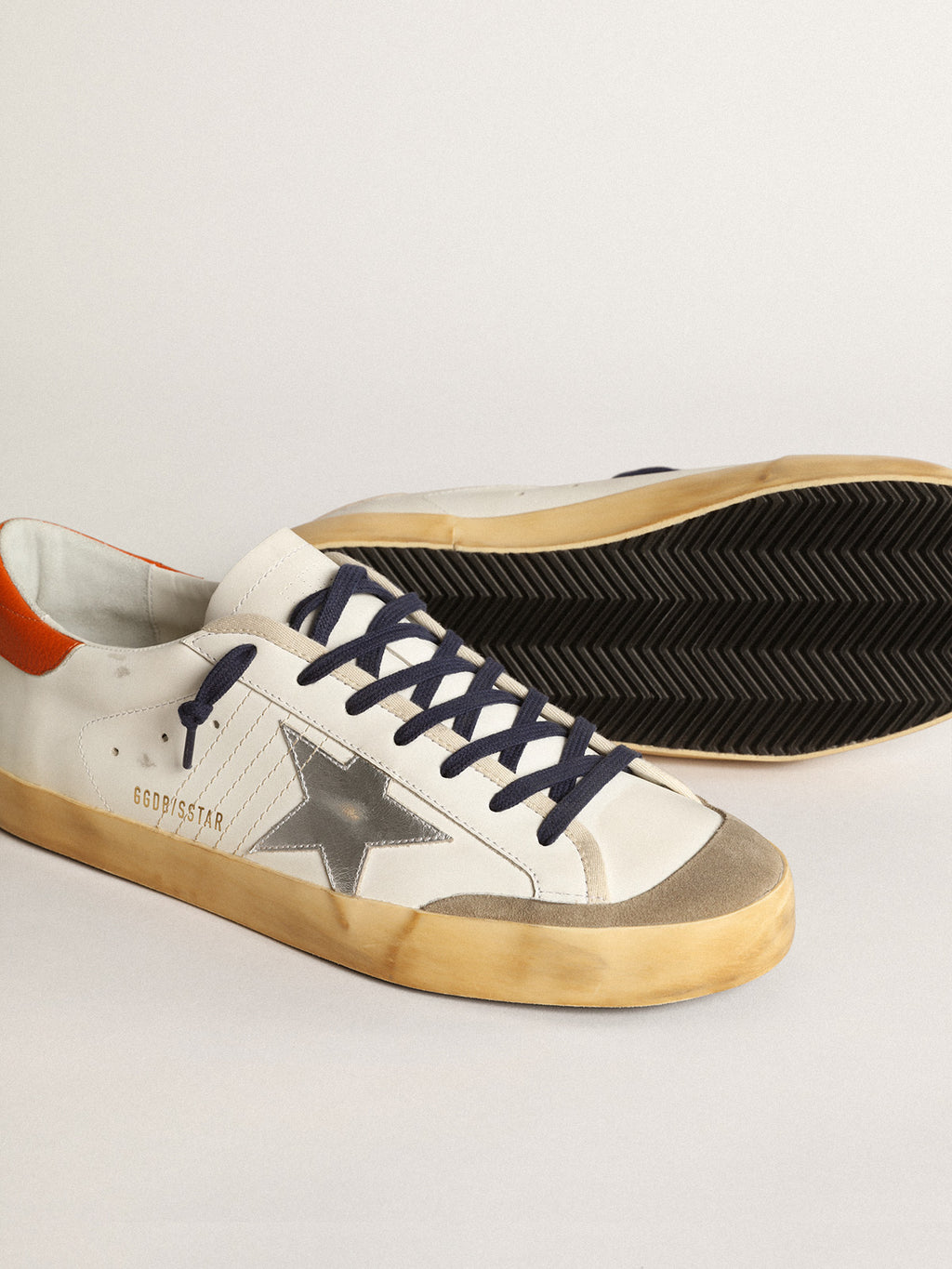Super-Star Penstar with silver star and orange heel tab| Golden Goose