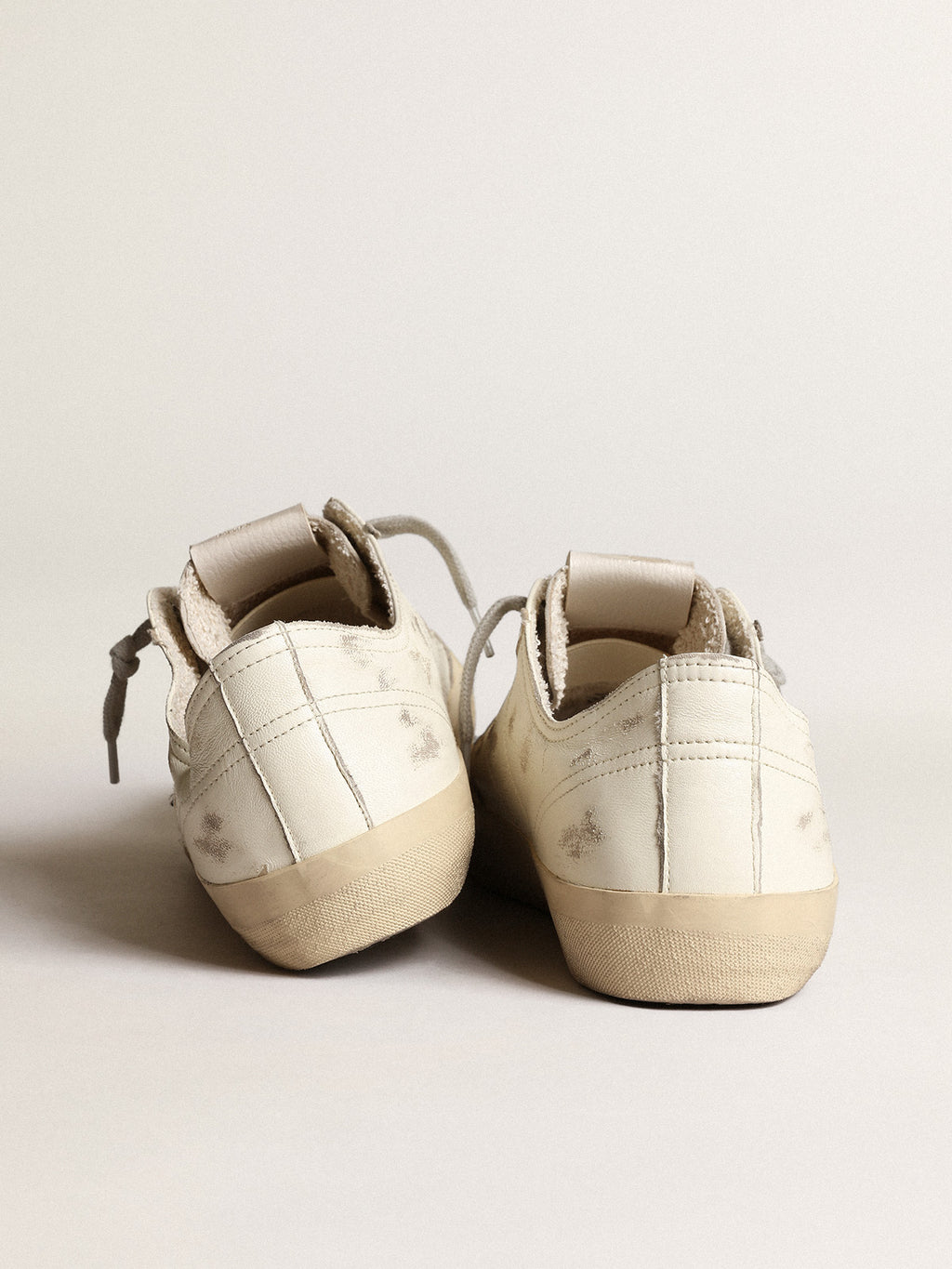 V-Star sneakers in off-white nappa leather with black nubuck star| Golden Goose
