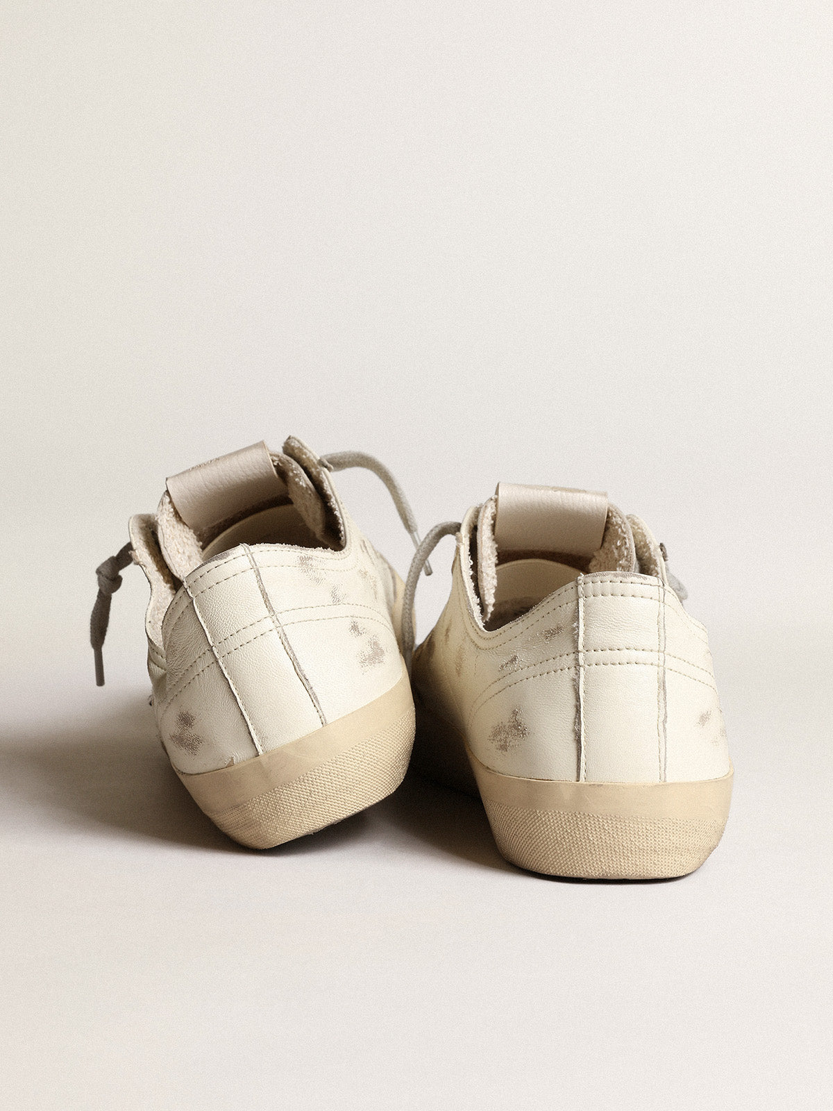 V-Star sneakers in off-white nappa leather with black nubuck star| Golden Goose