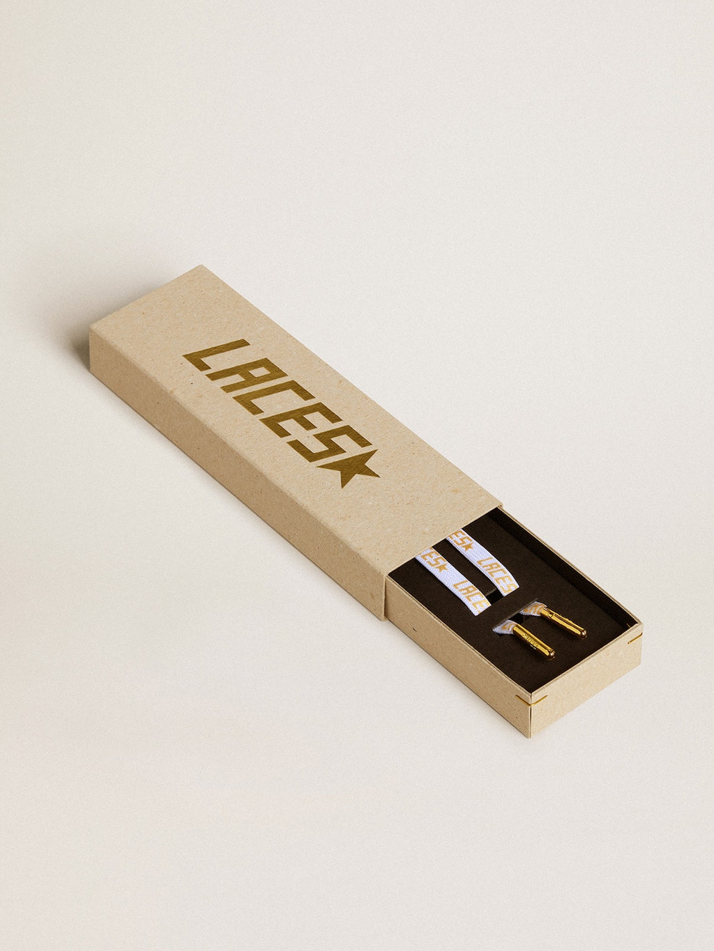 White laces with contrasting gold-colored 'Laces' lettering| Golden Goose