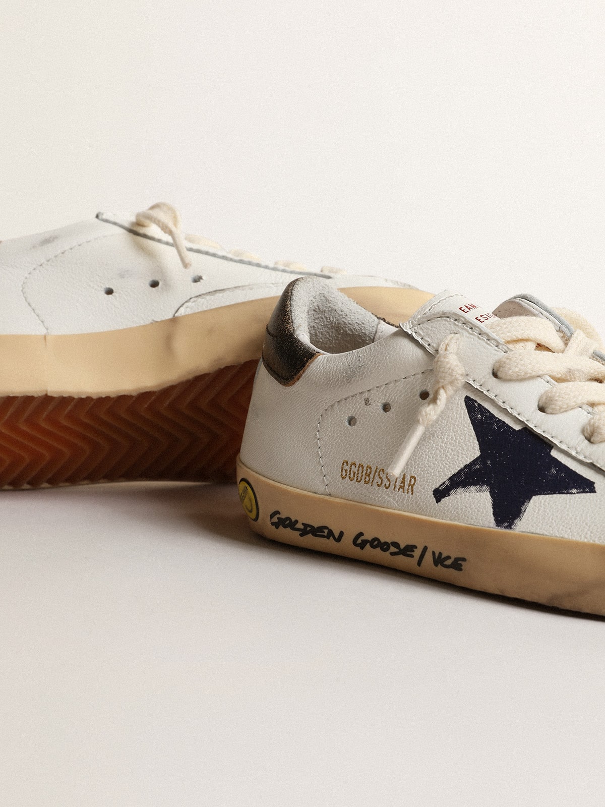 Super-Star Young in nappa with a printed star and black heel tab| Golden Goose