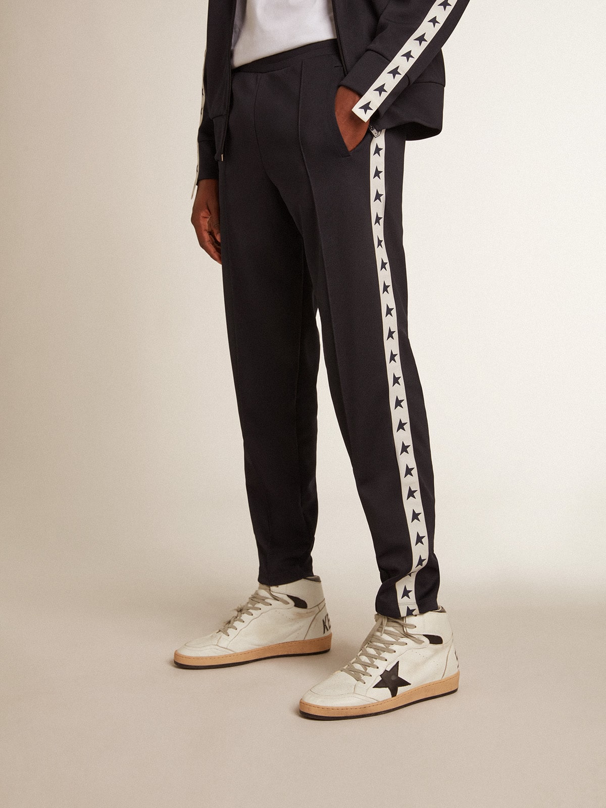 Dark blue joggers with contrasting strip and stars| Golden Goose