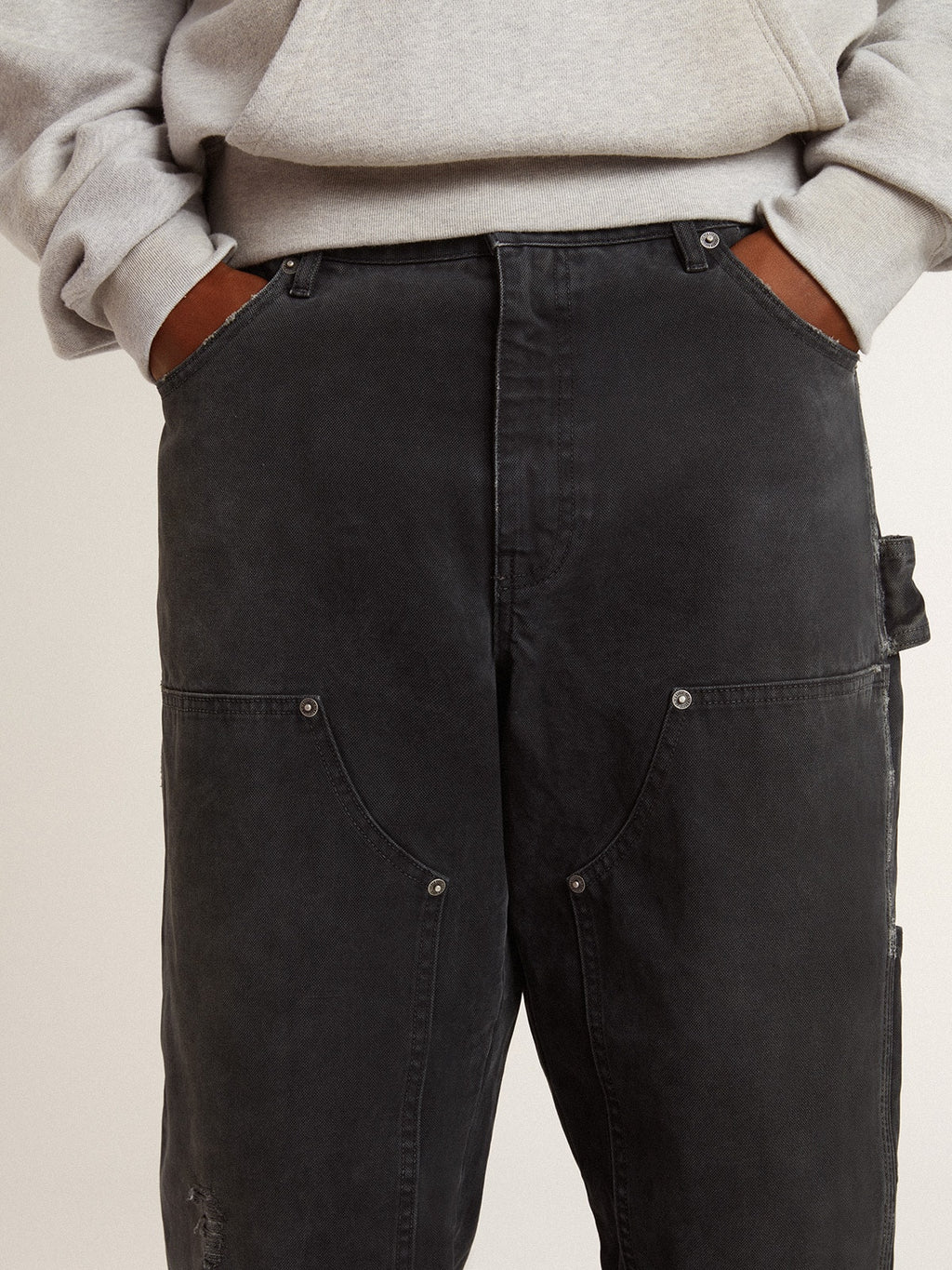 Men's distressed black cotton jeans with front patches| Golden Goose