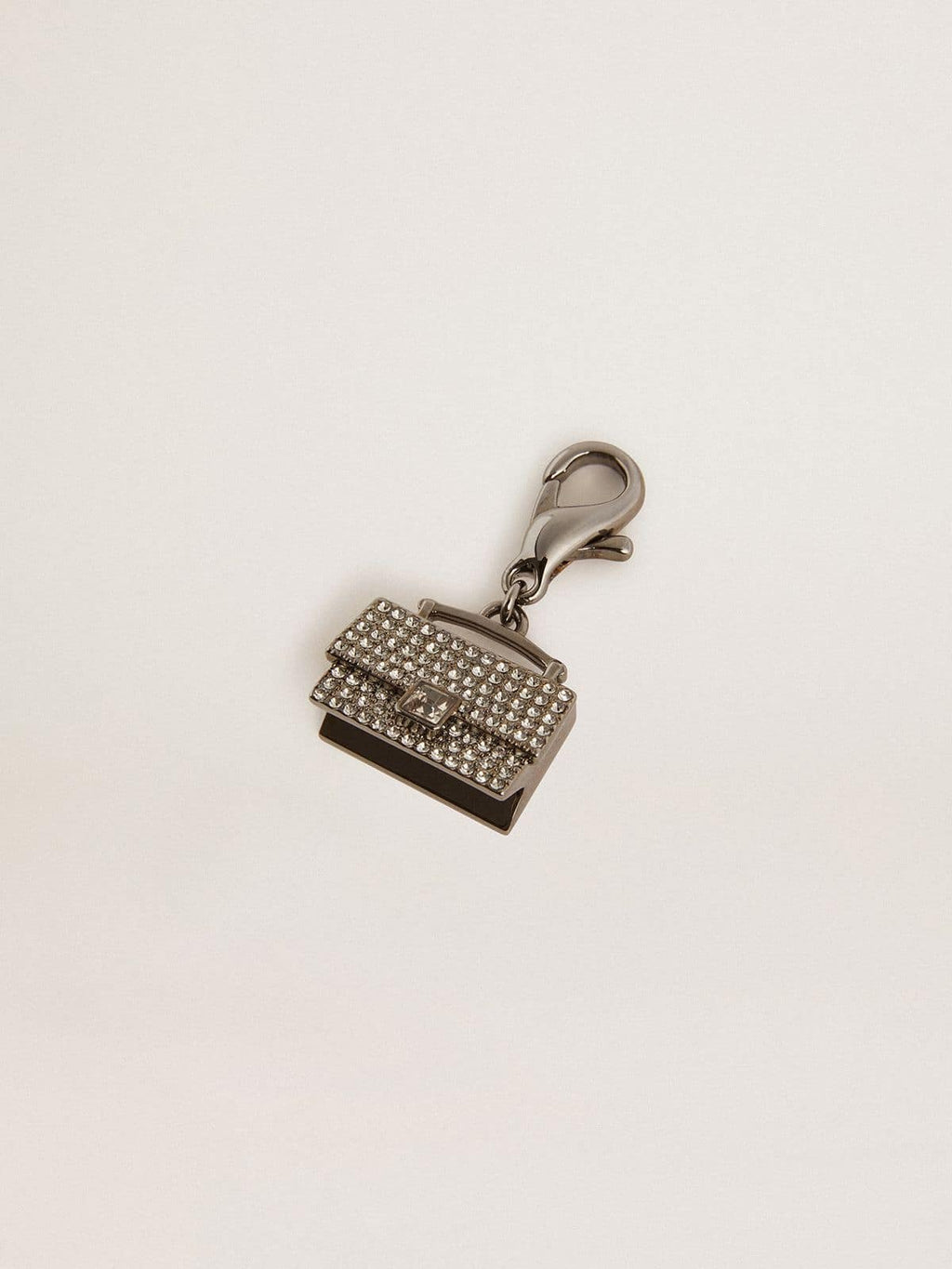 Purse-shaped charm in silver-colored brass with crystals| Golden Goose
