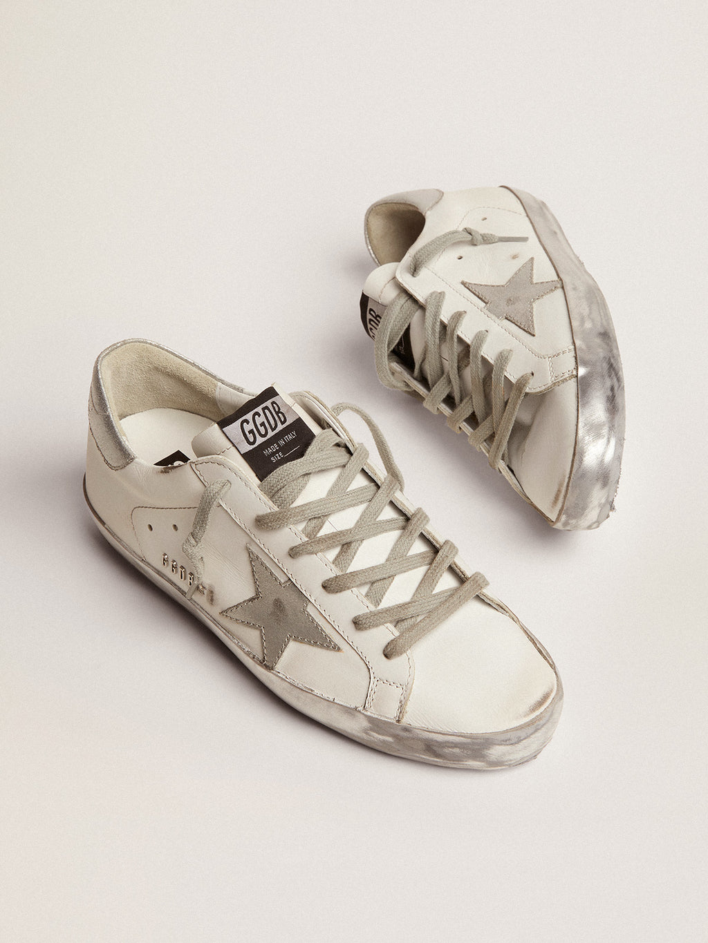 Women's Super-Star with silver sparkle foxing and metal stud lettering| Golden Goose