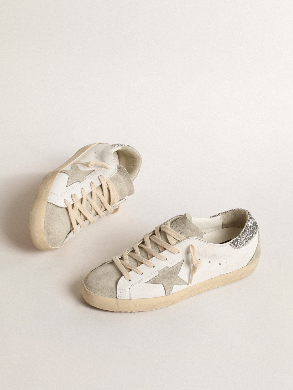 Women's Super-Star with gray star and silver glitter heel tab| Golden Goose