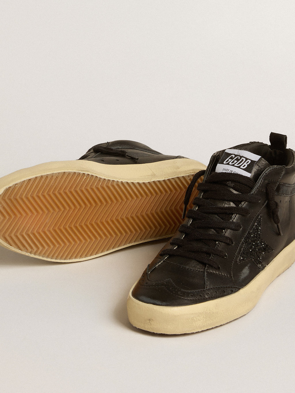 Mid Star in black nappa with black glitter star and suede flash| Golden Goose