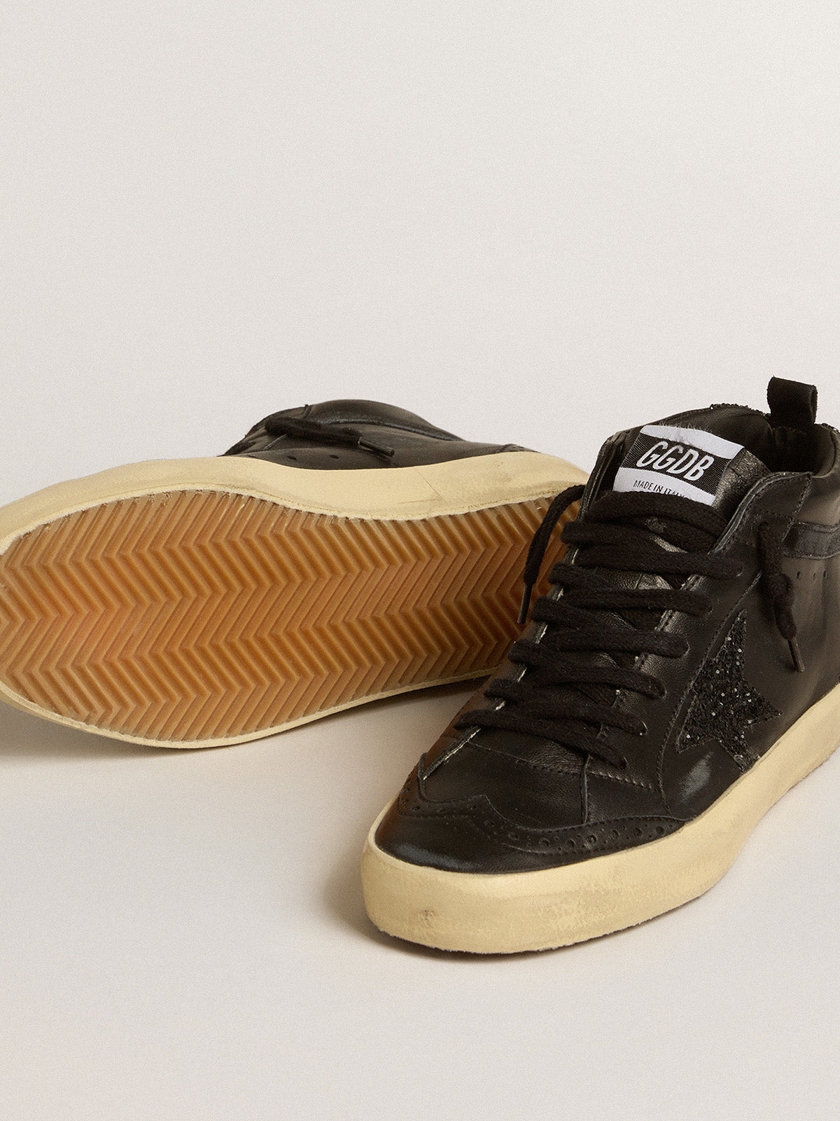 Mid Star in black nappa with black glitter star and suede flash| Golden Goose