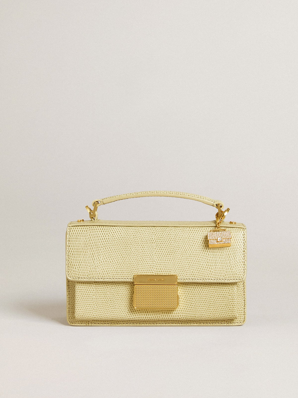 Purse-shaped charm in gold-colored brass with crystals| Golden Goose