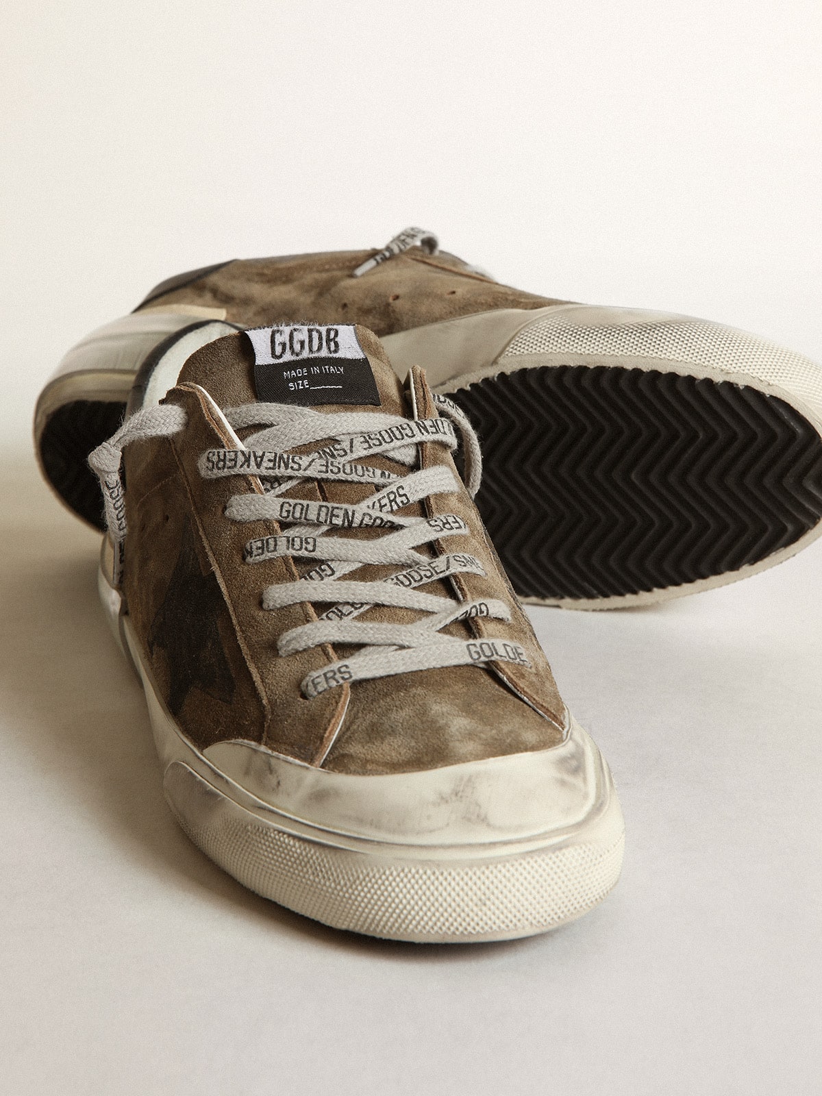 Super-Star LTD in military-green suede with screen-printed star| Golden Goose