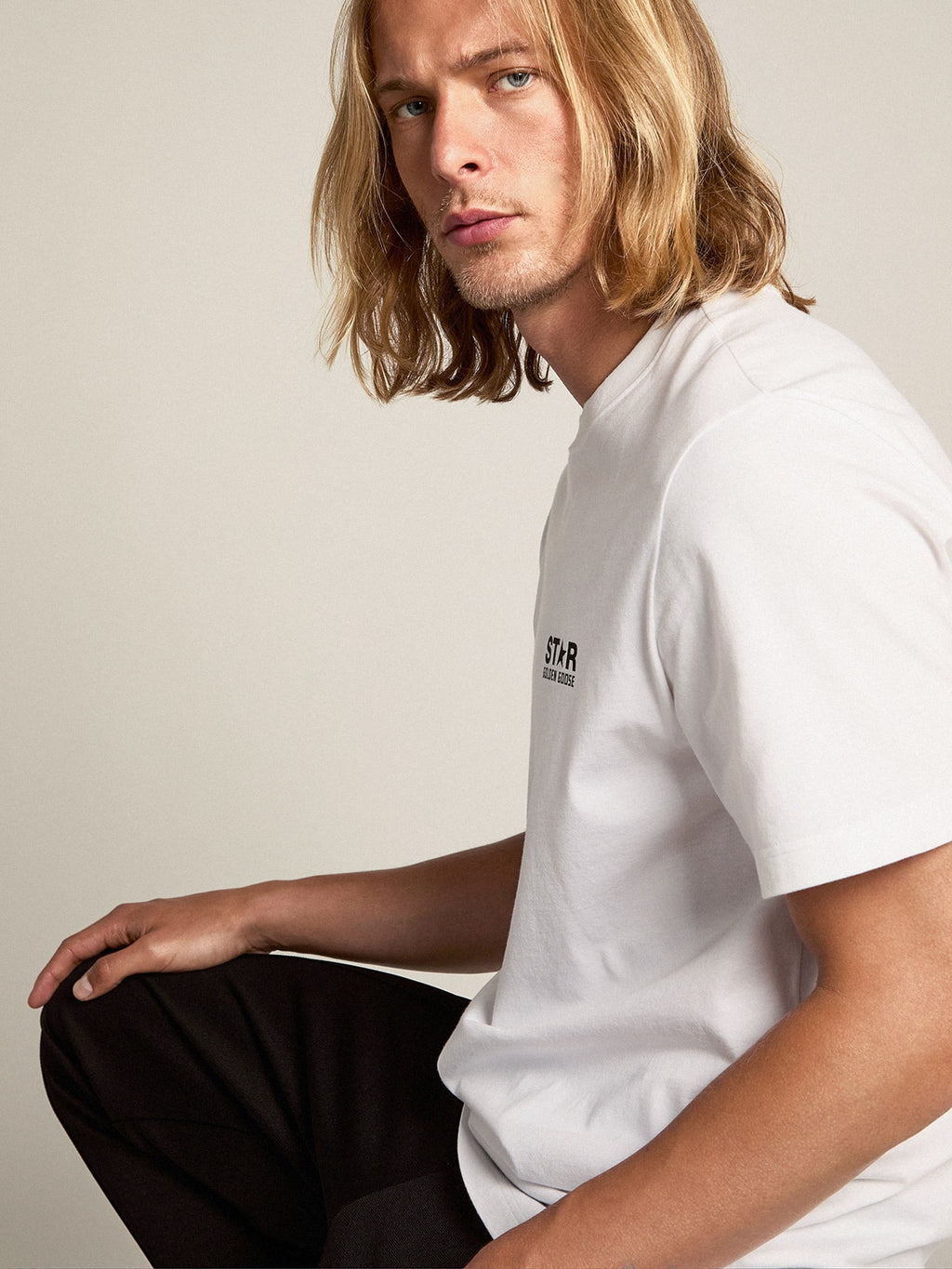 White T-shirt with contrasting black logo on the front| Golden Goose