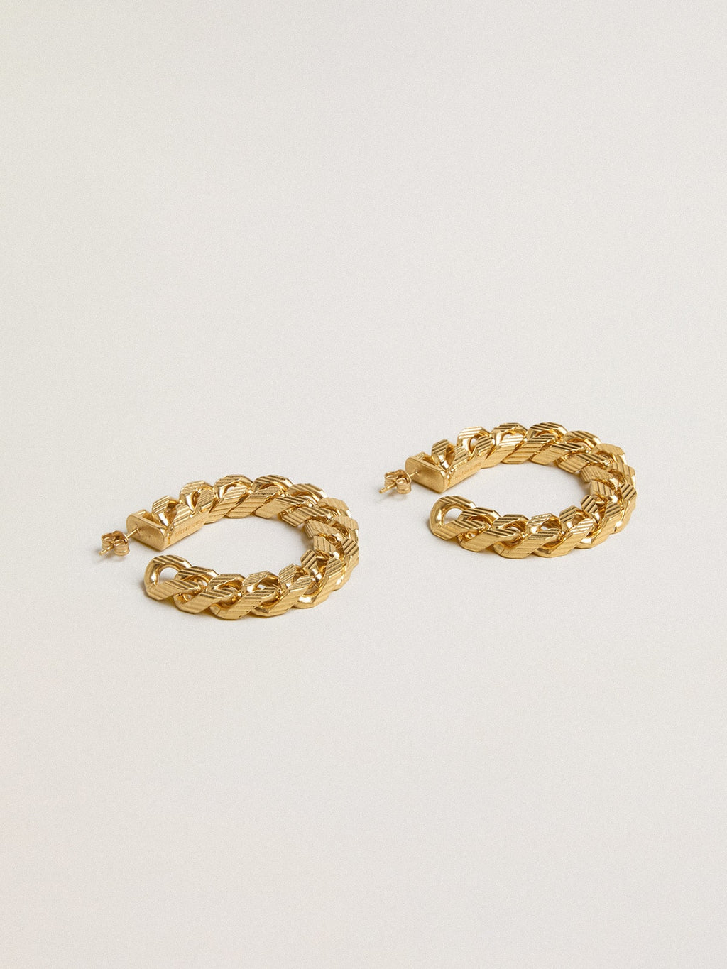 Chain hoop earrings with antique gold colored braided links| Golden Goose