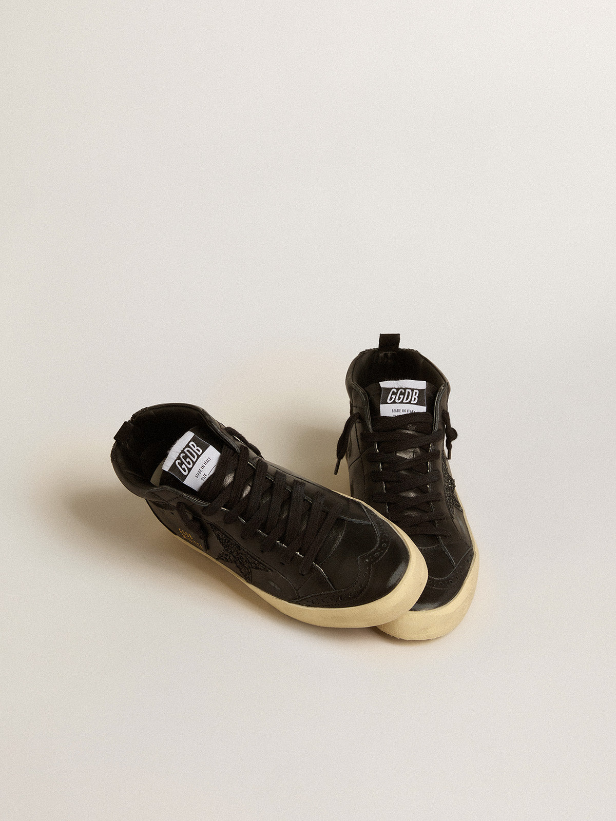 Mid Star in black nappa with black glitter star and suede flash| Golden Goose