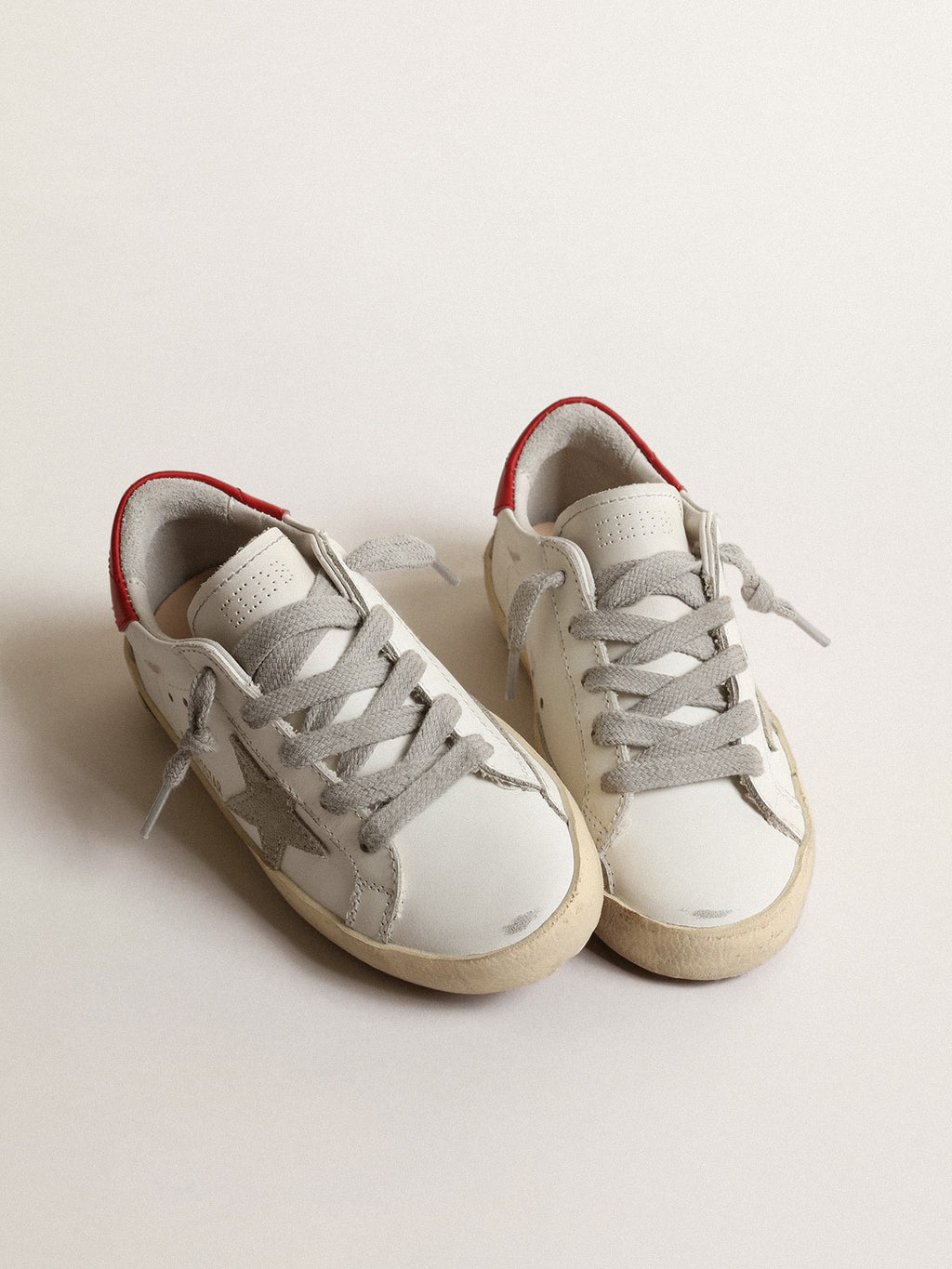 Super-Star Young with suede star and red leather heel tab| Golden Goose