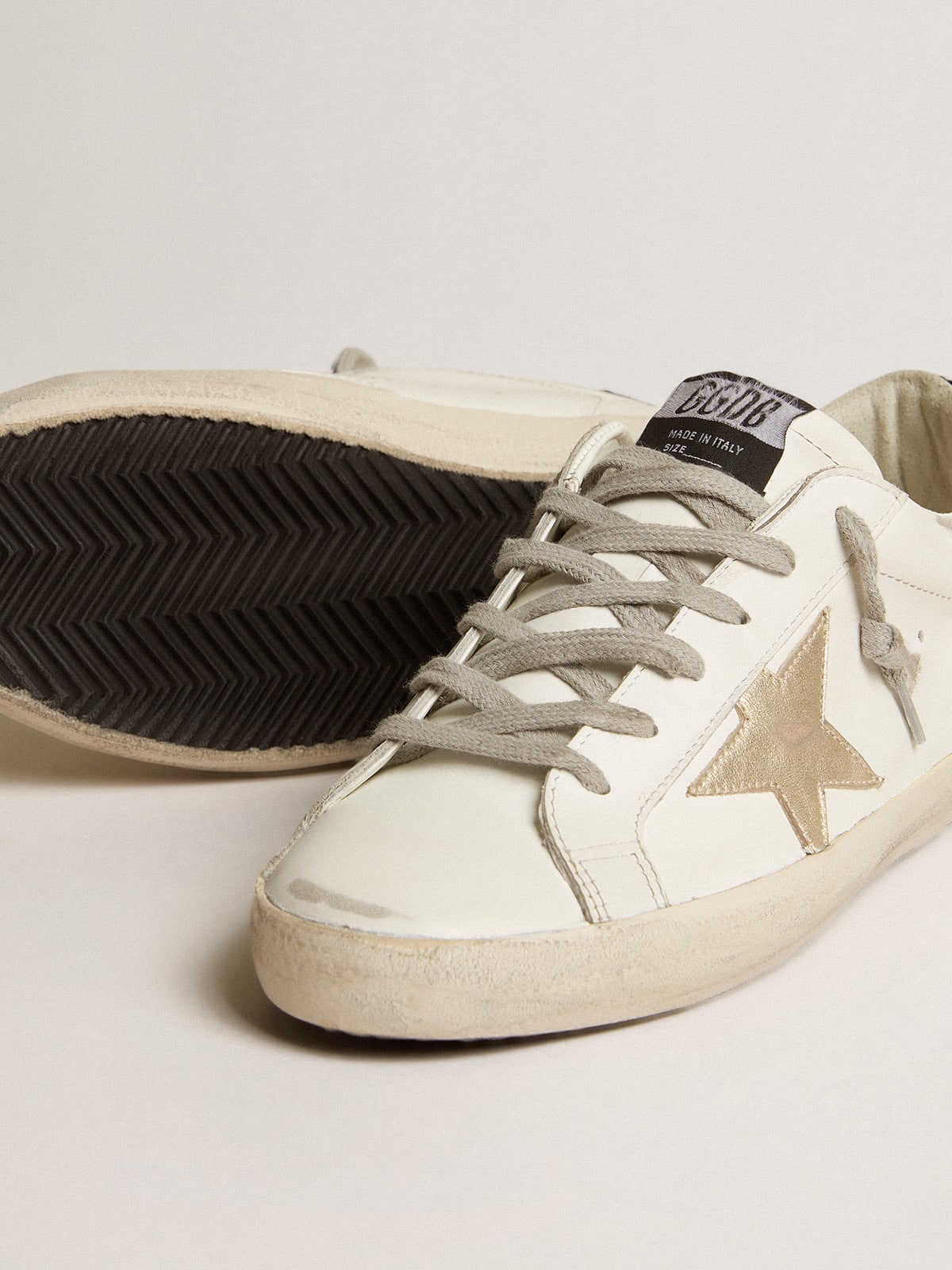 Women's Super-Star with gold star and black glitter heel tab| Golden Goose