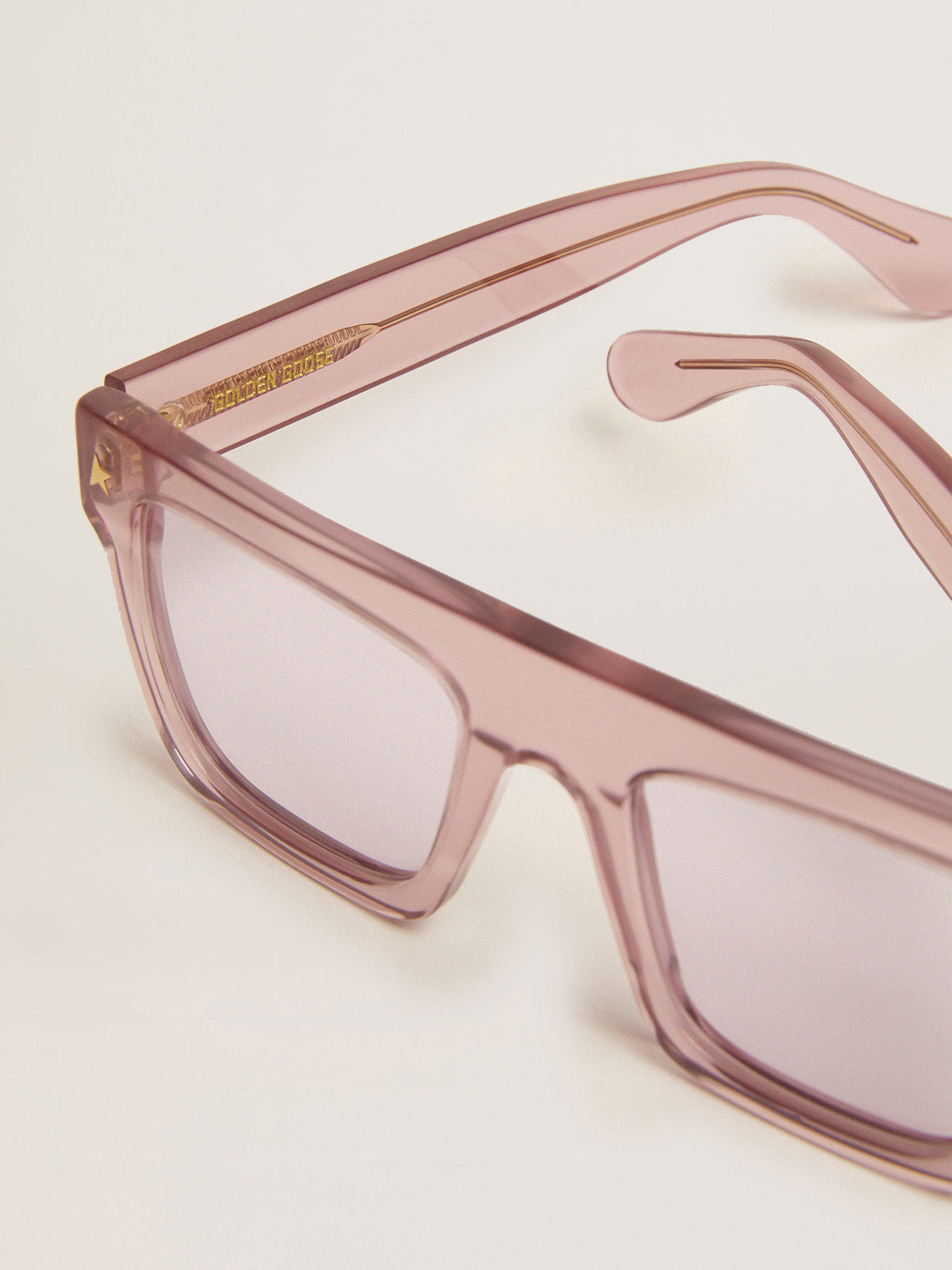 Square-style Sunframe Jamie with clear pink frame and pink lenses| Golden Goose