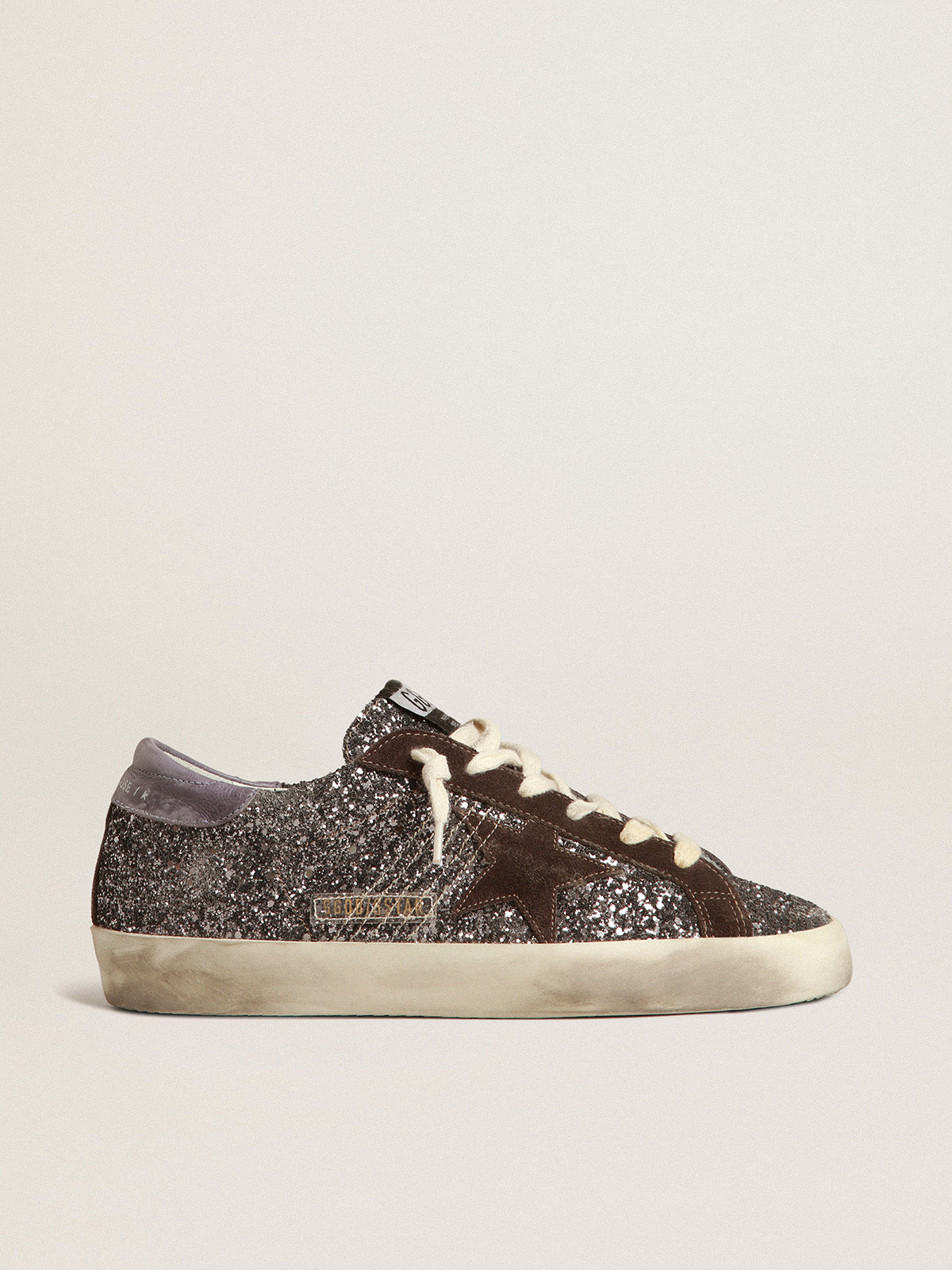 Super-Star in glitter with a brown star and lilac heel tab| Golden Goose