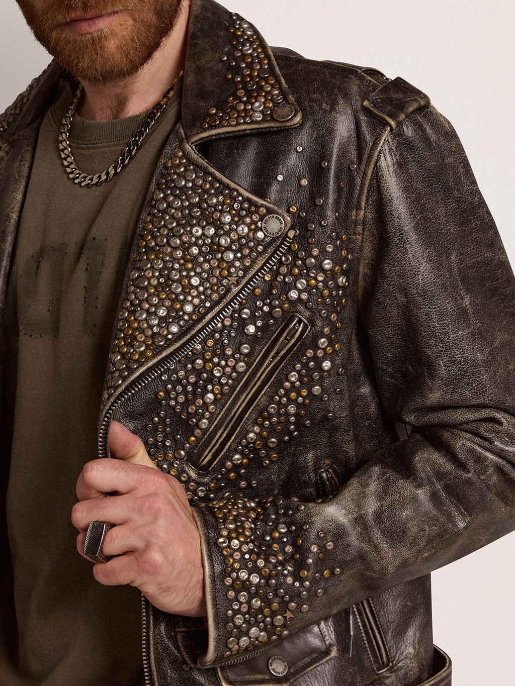 Men's leather biker jacket with hammered studs and adhesive tape| Golden Goose